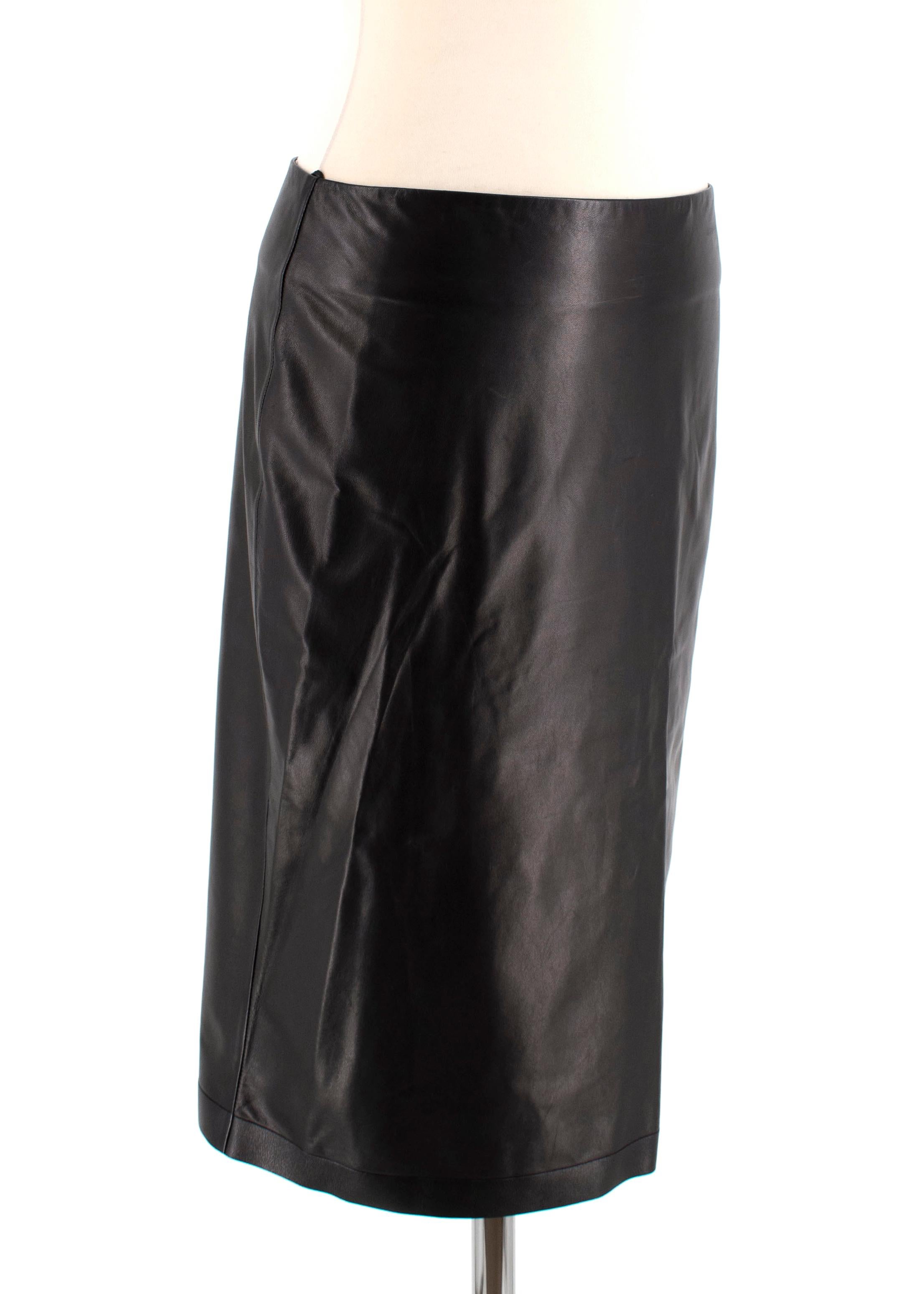 Tom Ford Lambskin Black Pencil Skirt

- Soft lamb skin leather with slight texture
- Straight cut
- Light weight thin leather
- Silk black lining
- Hidden zip fastening at the back
- Slit at the back
- Below the knee length

Made in Italy

Fabric