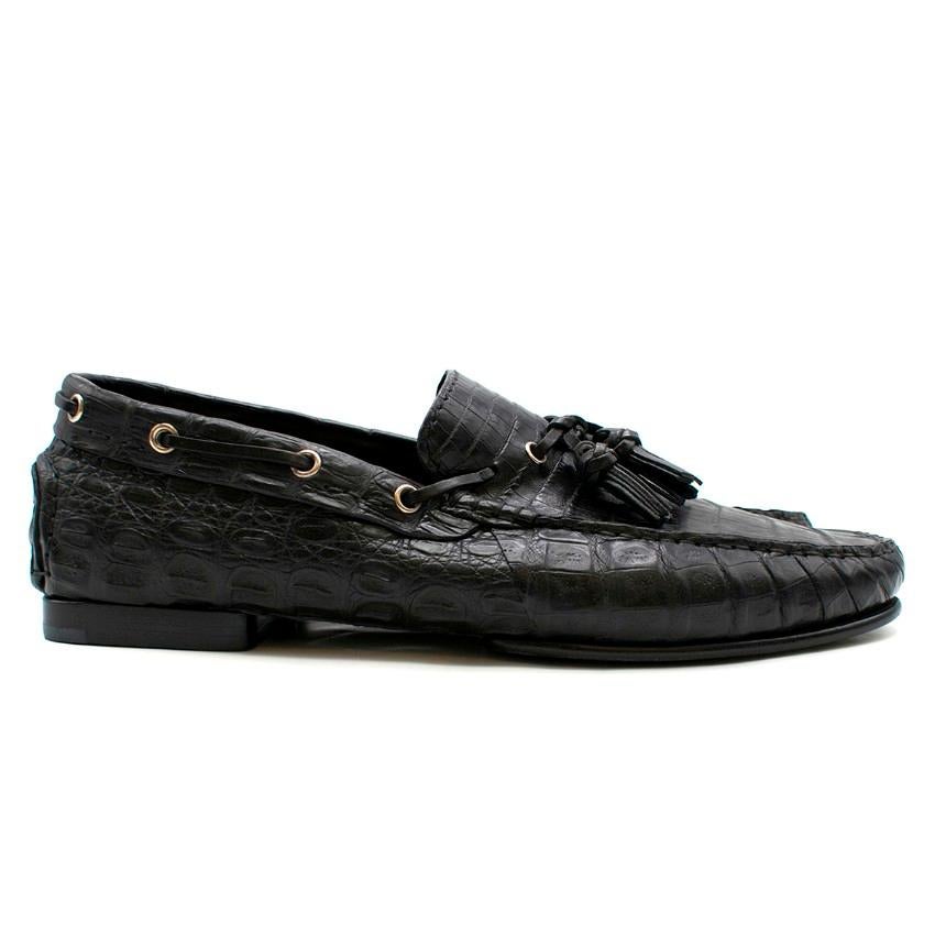 Tom Ford Crocodile Leather Loafers

- Black crocodile leather loafers
- Front tassel feature
- Woven leather side
- Slip on
- Black leather lining with Tom Ford's logo embroidered 
- Leather sole

Please note, these items are pre-owned and may show
