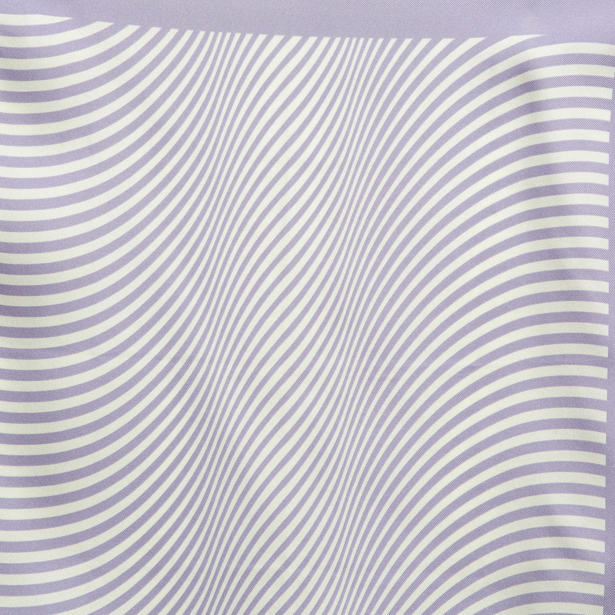 Enhance your attire with the Tom Ford pocket square. Crafted from premium silk it features a refined light purple stripe design adding a touch of finesse to any outfit. Perfect for formal and casual occasions this pocket square exudes timeless style