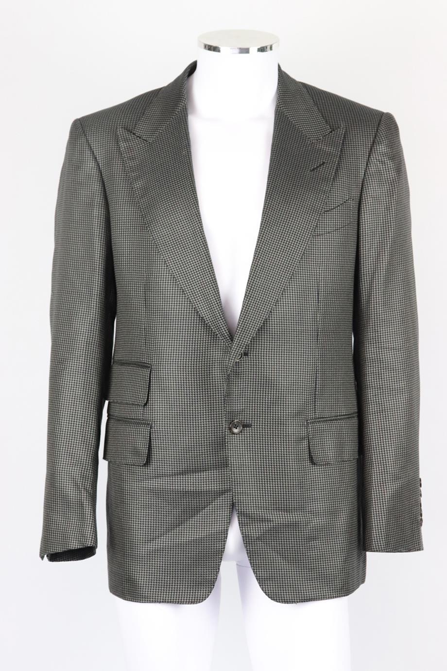 Tom Ford men's houndstooth cotton and silk blend blazer. Tonal-grey. Long sleeve, v-neck. Button fastening at front. 51% Cotton, 49% silk; lining: 50% silk, 50% rayon. Size: IT 52 (XLarge, EU 52, UK/US Chest 42). Shoulder to shoulder: 17 in. Chest:
