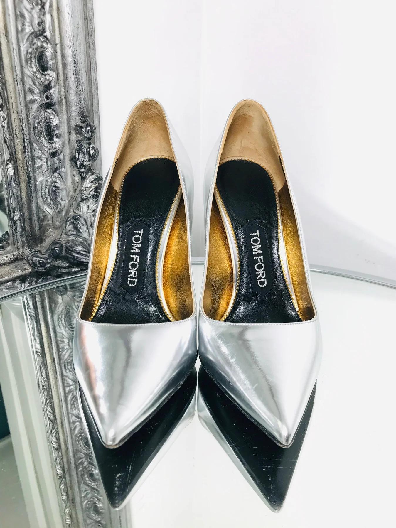 Tom Ford Metallic Leather Pumps

Silver tone metal stiletto heel with round detail. Pointed toe. Leather insole.

Additional information:
Size – 35.5
Condition – Very Good ( some minor signs of wear)
Comes with- Box, Dustbags and Spare Heel Tips