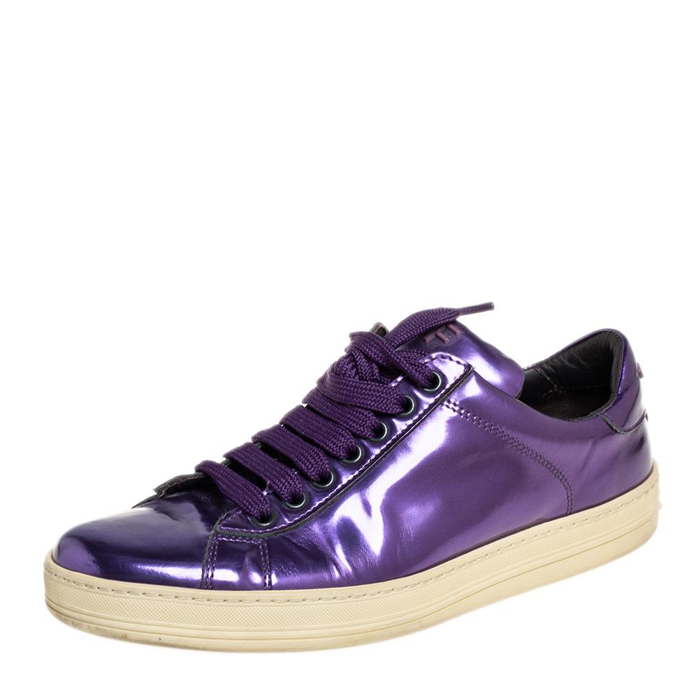 Bring home the luxurious high-fashion touch with these sneakers from Tom Ford. Crafted from metallic purple leather, these sneakers come flaunting suave details like the lace-ups and the label on the counters. You wouldn't want to miss out on such a