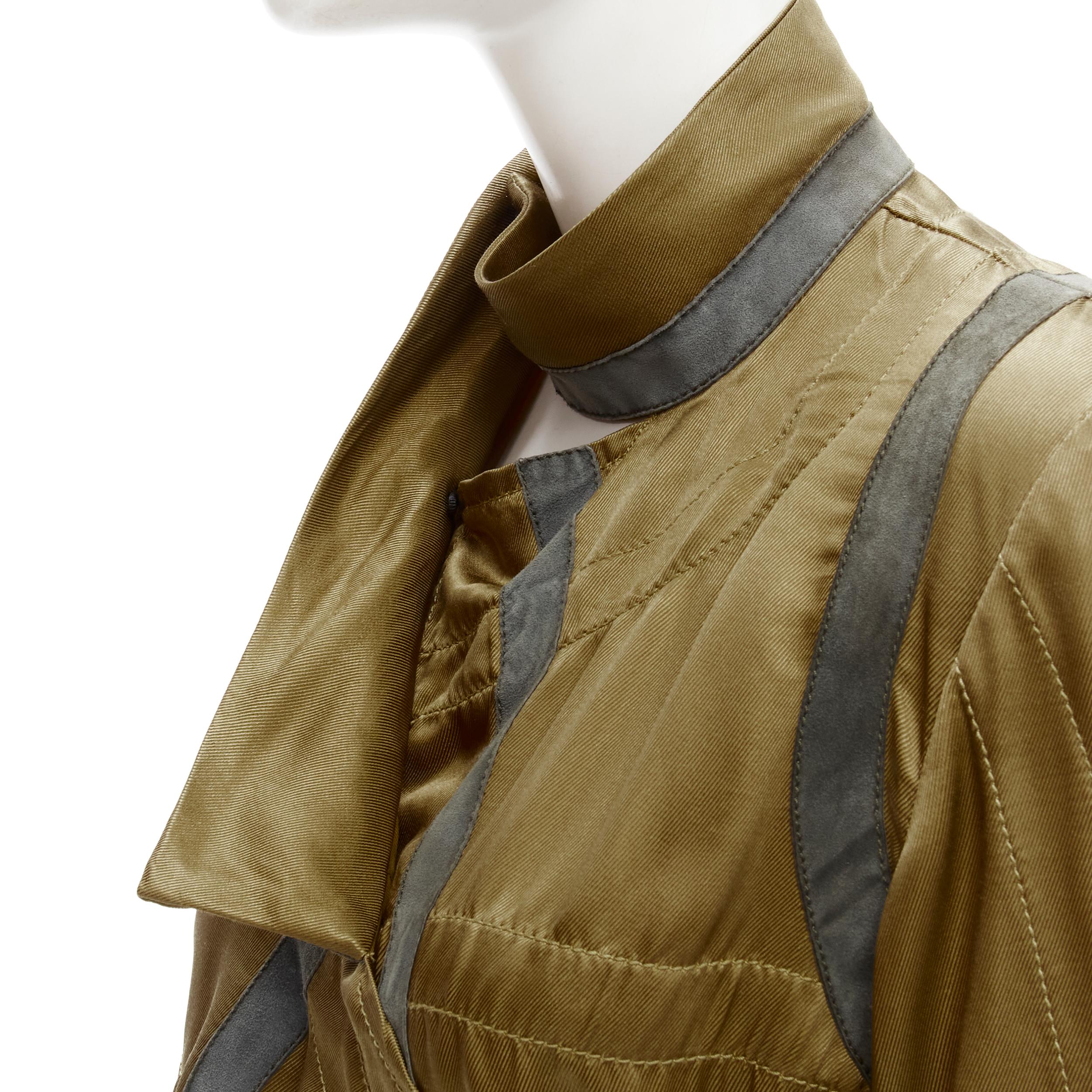 TOM FORD military green silk grey suede trim anorak jacket IT36 XS 
Reference: JACG/A00035 
Brand: Tom Ford 
Material: Silk 
Color: Green 
Pattern: Solid 
Closure: Zip 
Extra Detail: Open front with tie strings. Khaki green silk-blend upper. Grey