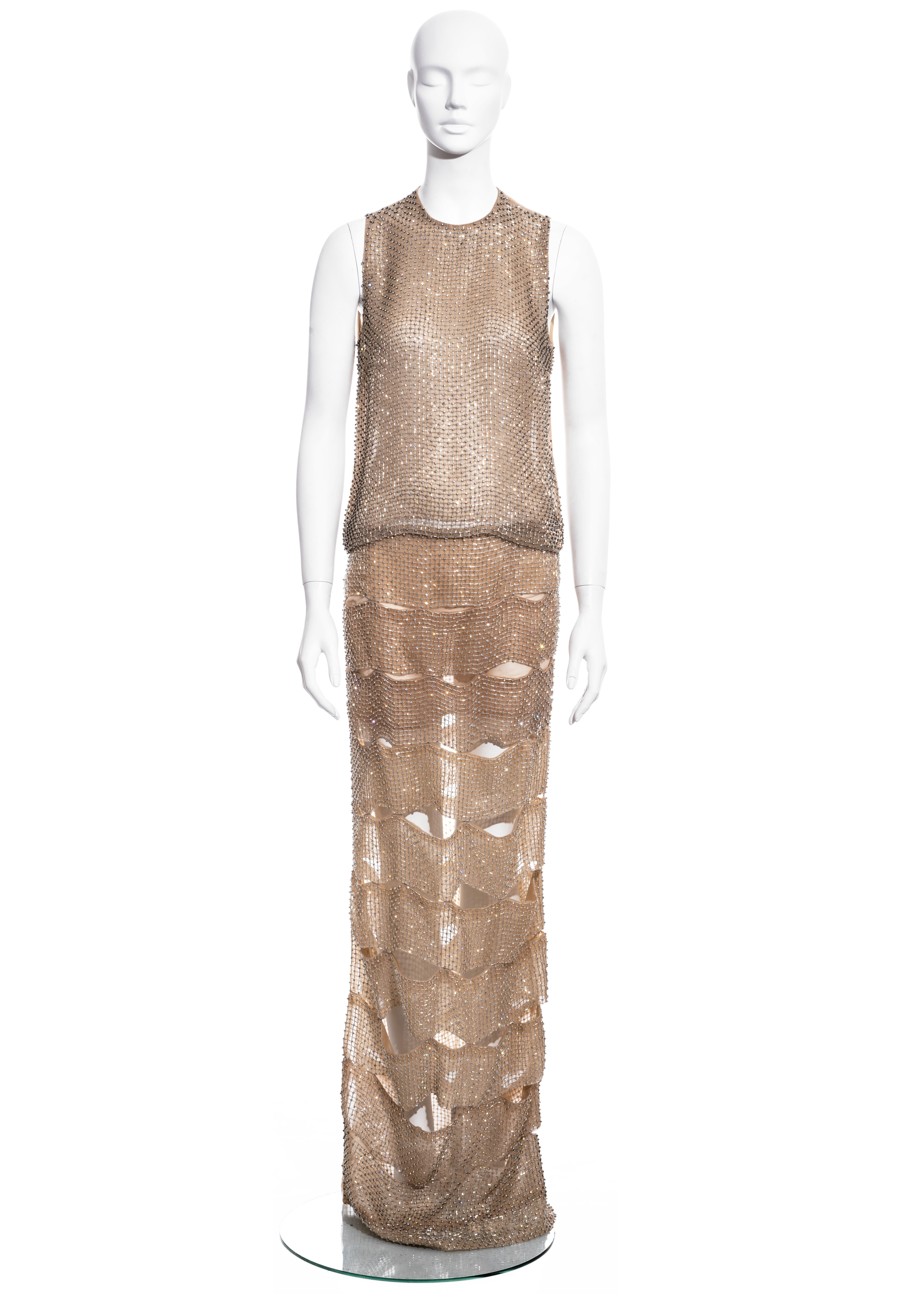 ▪ Tom Ford evening dress comprising; skirt and top  
▪ Constructed with nude silk organza and a lattice of glass beads 
▪ Skirt formed from pieced strips  
▪ Matching bodice with sheer back panel
▪ IT 40 - FR 36 - UK 8 - US 4 
▪ Spring-Summer 2013
