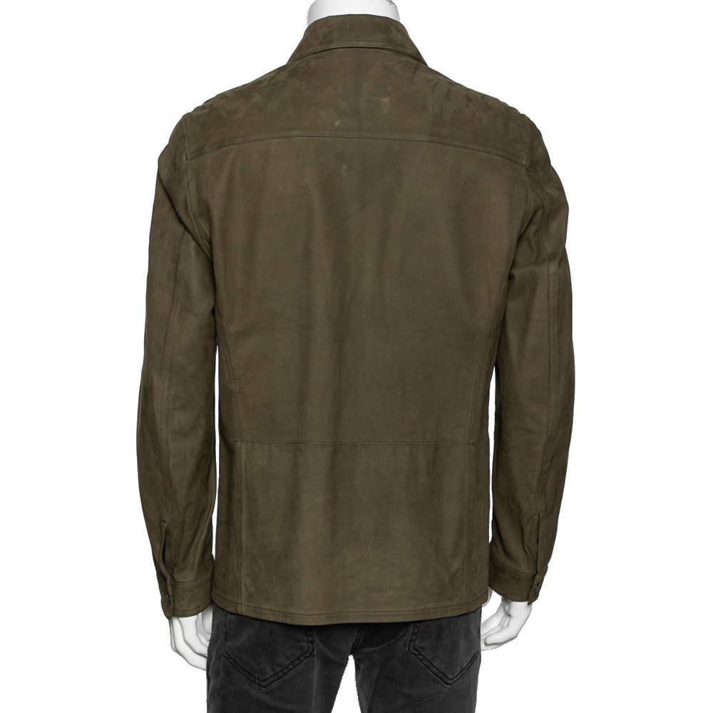 Add this Tom Ford jacket to your wardrobe for a stylish upgrade. It has a cool olive green hue and is made using leather into a well-fitted shape. It is complete with front buttons and pockets.

Includes: Original Dustbag
