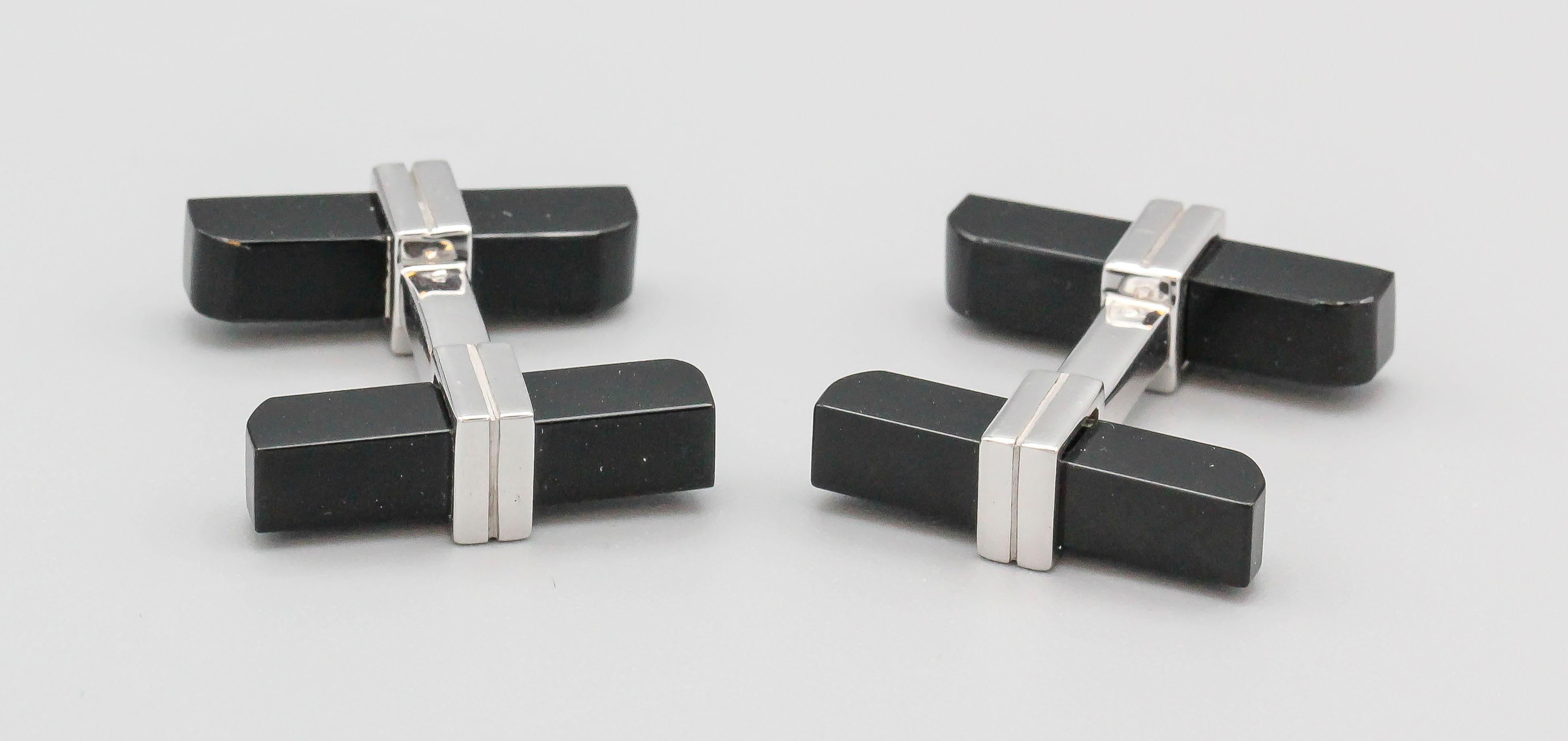 Fine pair of onyx and 18K white gold bar cufflinks by Tom Ford. Designed as bar cufflinks, the onyx bar insert removes for ease of installation.

Hallmarks: Tom Ford, Italy, Italian Manufacturer ID, 750.