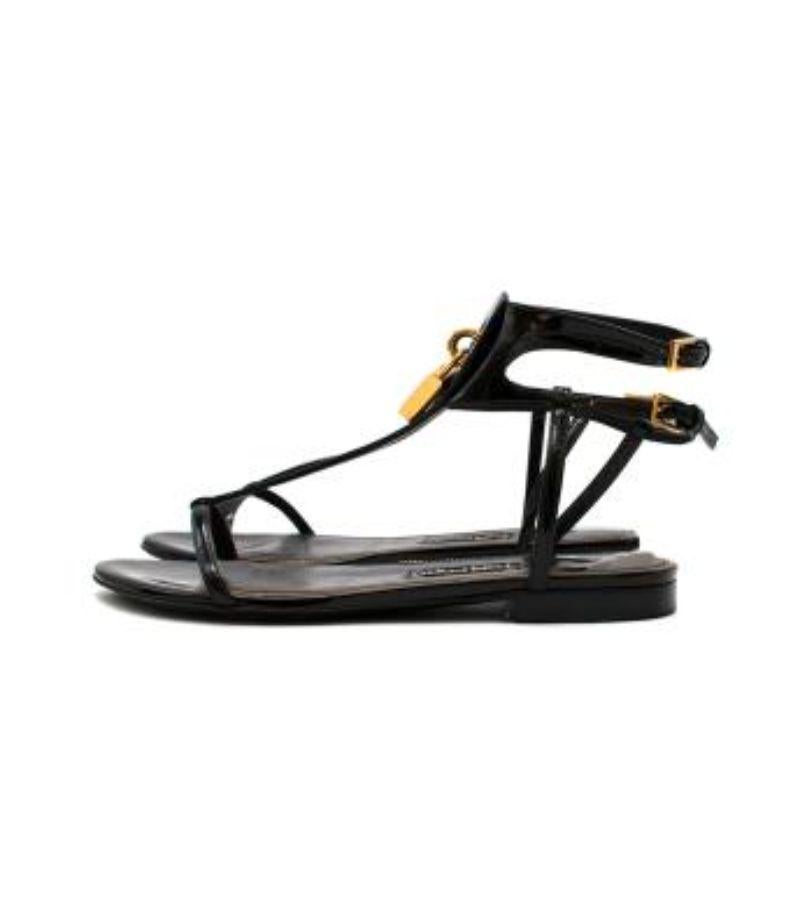 Tom Ford Patent Padlock Flat Sandals

-Patent leather 
-Gold tone hardware 
-Open toe & back 
-Ankle fastening 
-Branded leather insoles 

Material:

Leather 

Made in Italy 

9.5/10 excellent conditions, please refer to images for further details.