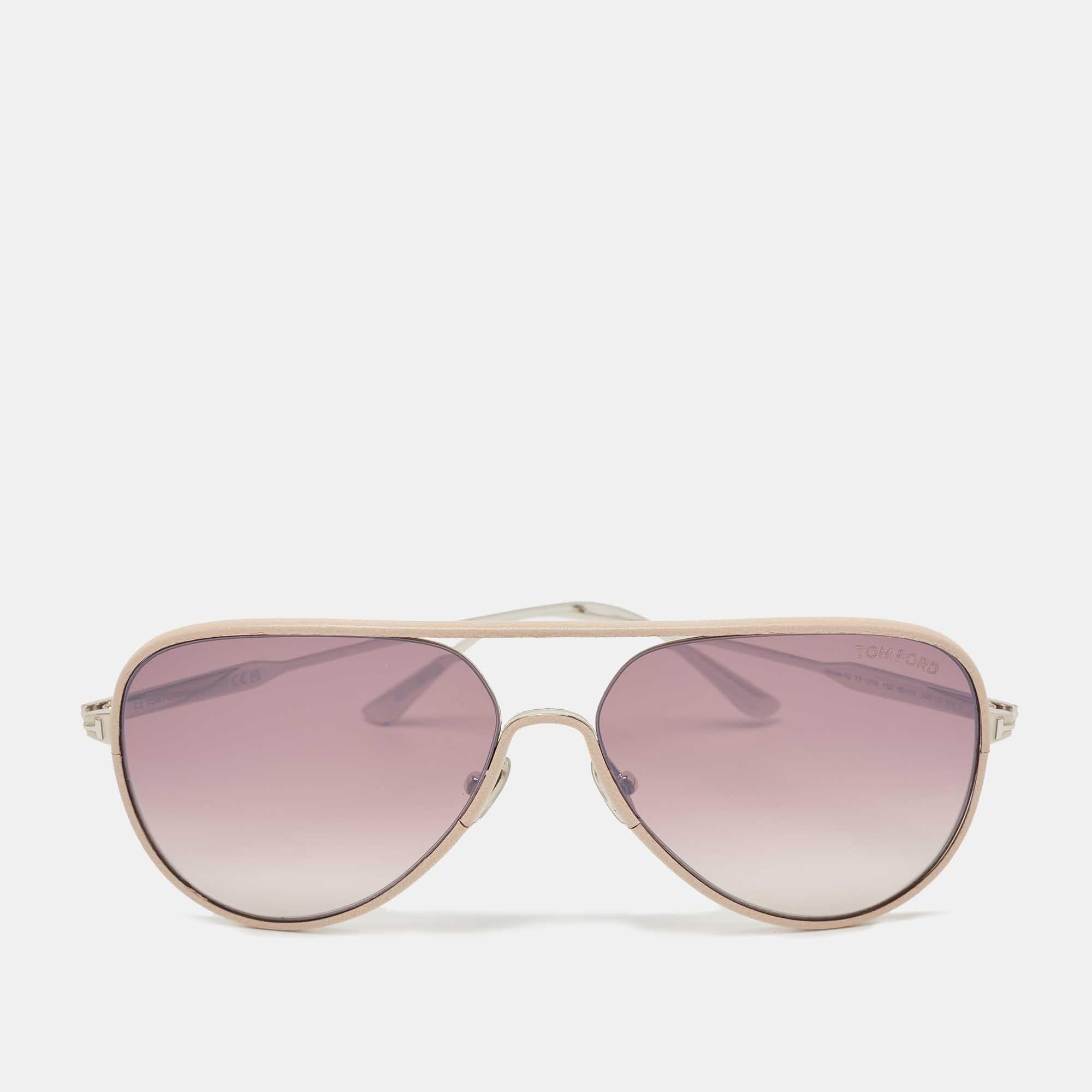 This pair of Tom Ford sunglasses is expertly crafted for women with high taste in fashion. A perfect companion for sunny day outings, it exhibits silver-tone hardware and branded temples.

Includes
Original Box, Info Booklet, Original Dust Cloth,