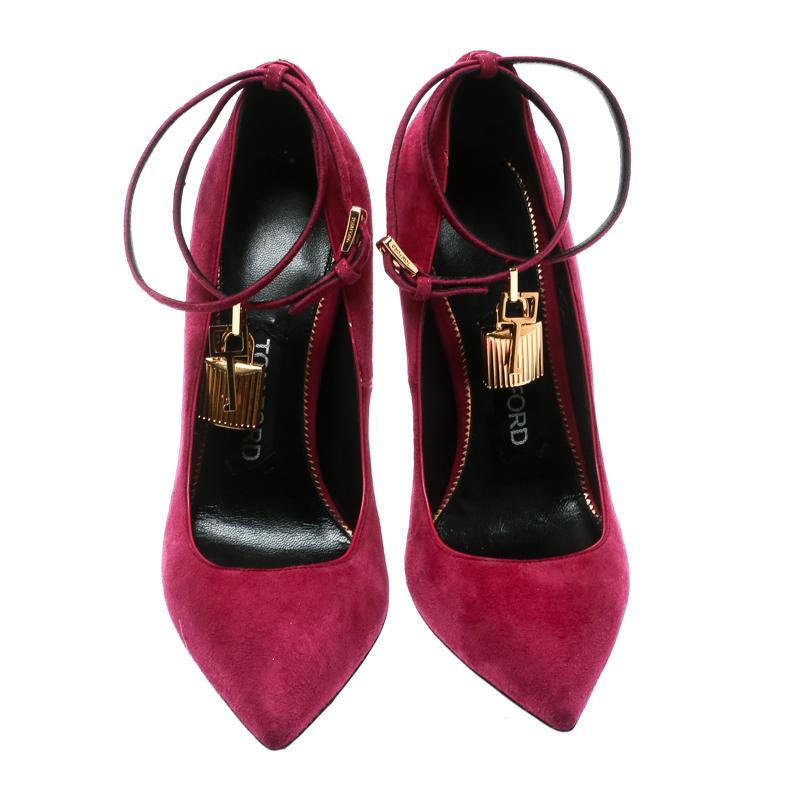 Slip into this pair of perfect pumps lined with leather and walk in style. An ideal mix of comfort and fashion, these pumps are formed out of purple suede and shaped as pointed toes with 10.5 cm heels, and ankle wraps with padlocks. Create the