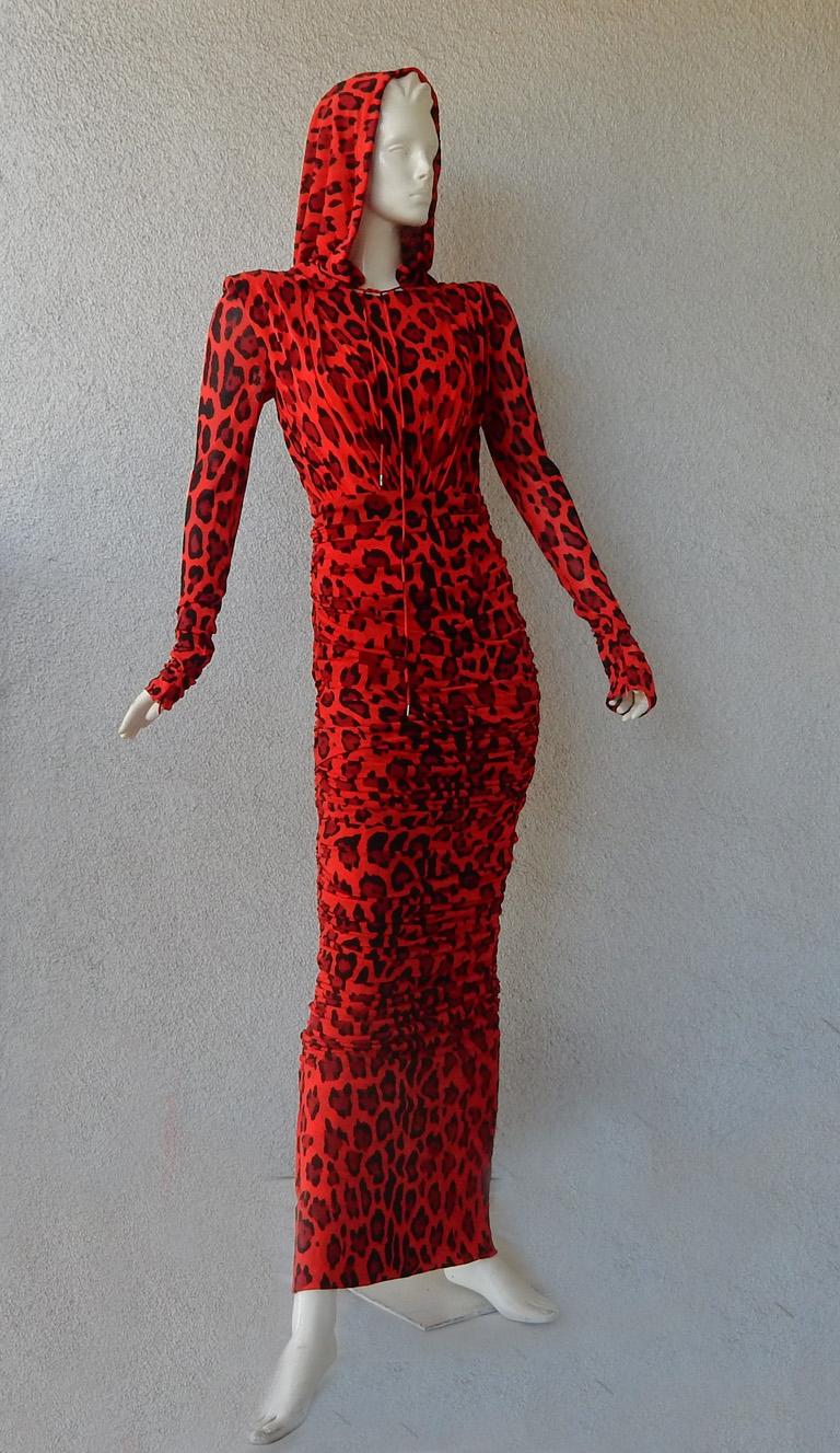 Ultra chic Tom Ford hooded long red cheetah print dress.  Wonderful entrance making impact!   Fashioned of body hugging jersey, fully lined with interior bra corset.  Also  features back zipper closure and open back slit.  Ruched gathering at