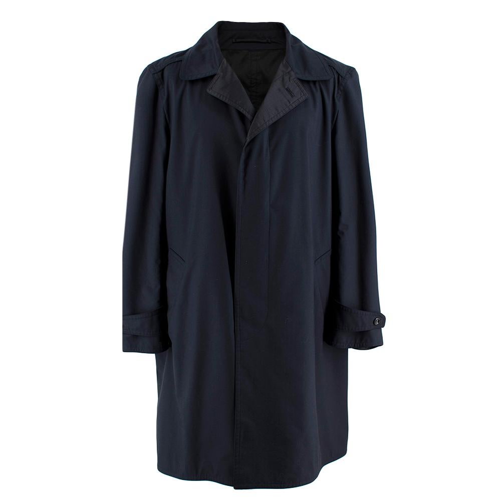 Tom Ford Reversible Navy Blue Wool Trench Coat

- Reversible materials
- Hidden double buttons
- Deep pockets
- Buttoned cuffs

Materials:
Main
- 50% Cotton 
- 40% Wool 
- 10% Silk
Interior/Padding
- 100% Polyester

Made in Italy 
Professional Clean