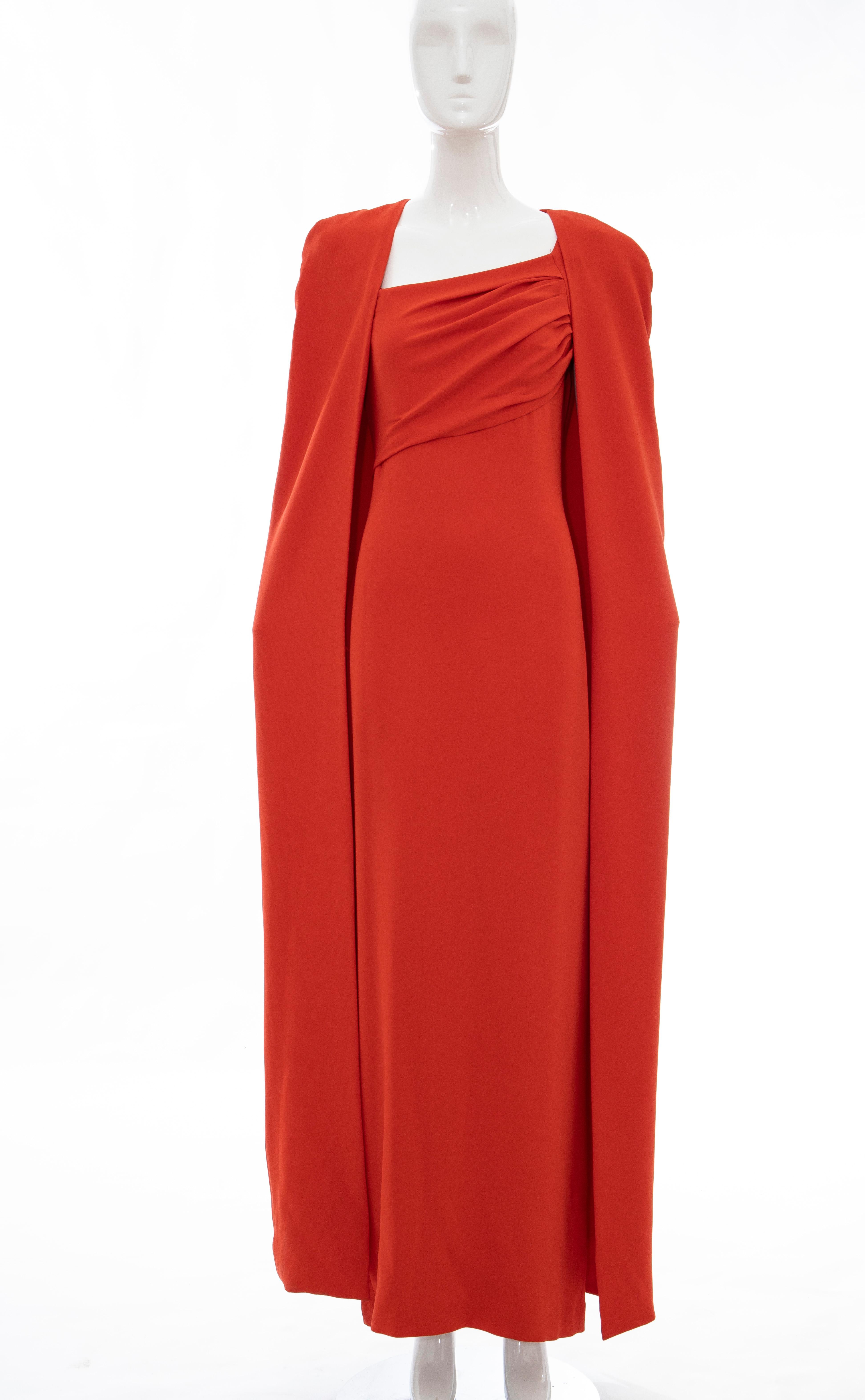 Tom Ford Runway Fall 2012, silk persimmon evening dress ensemble. Cape features tonal stitching throughout, open front and fully lined in silk. Dress features cap sleeves, gathering at bodice, slit at back, concealed back zip closure and fully lined
