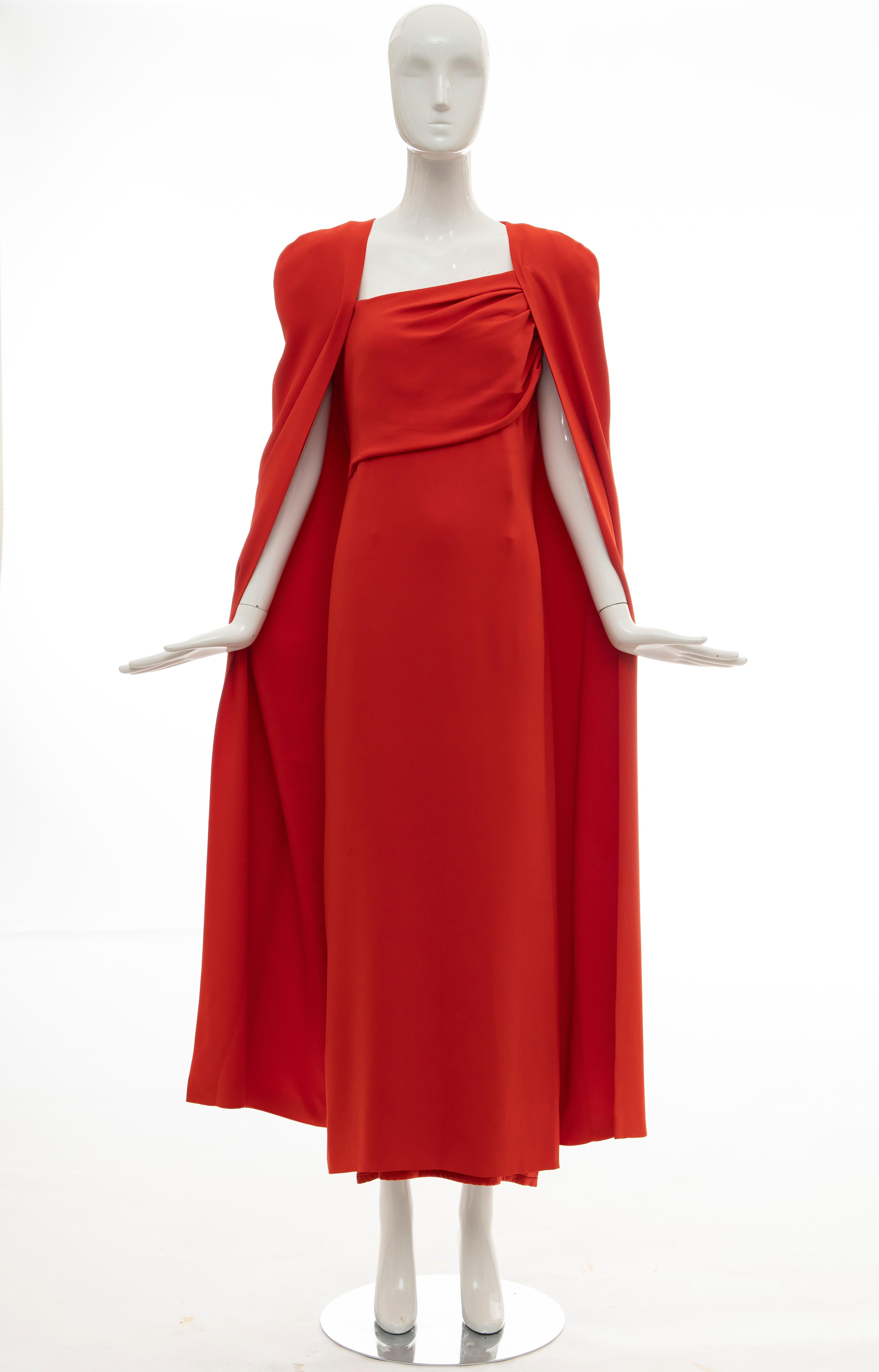 Tom Ford Runway Fall 2012, silk persimmon evening dress ensemble. Cape features tonal stitching throughout, open front and fully lined in silk. Dress features cap sleeves, gathering at bodice, slit at back and concealed zip closure at back and fully