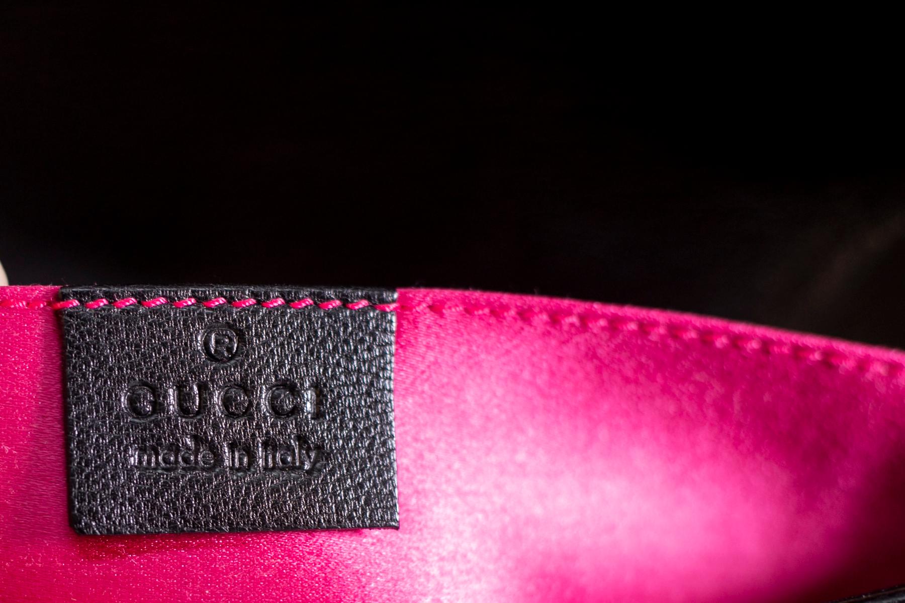 Superb Gucci shoulder bag by Tom Ford, limited edition in leather and stones, pink satin. Beautiful jewel work as an ornament equipped with an iconic horsebit. The bag is made of a soft black leather, while the center is embellished with the pink