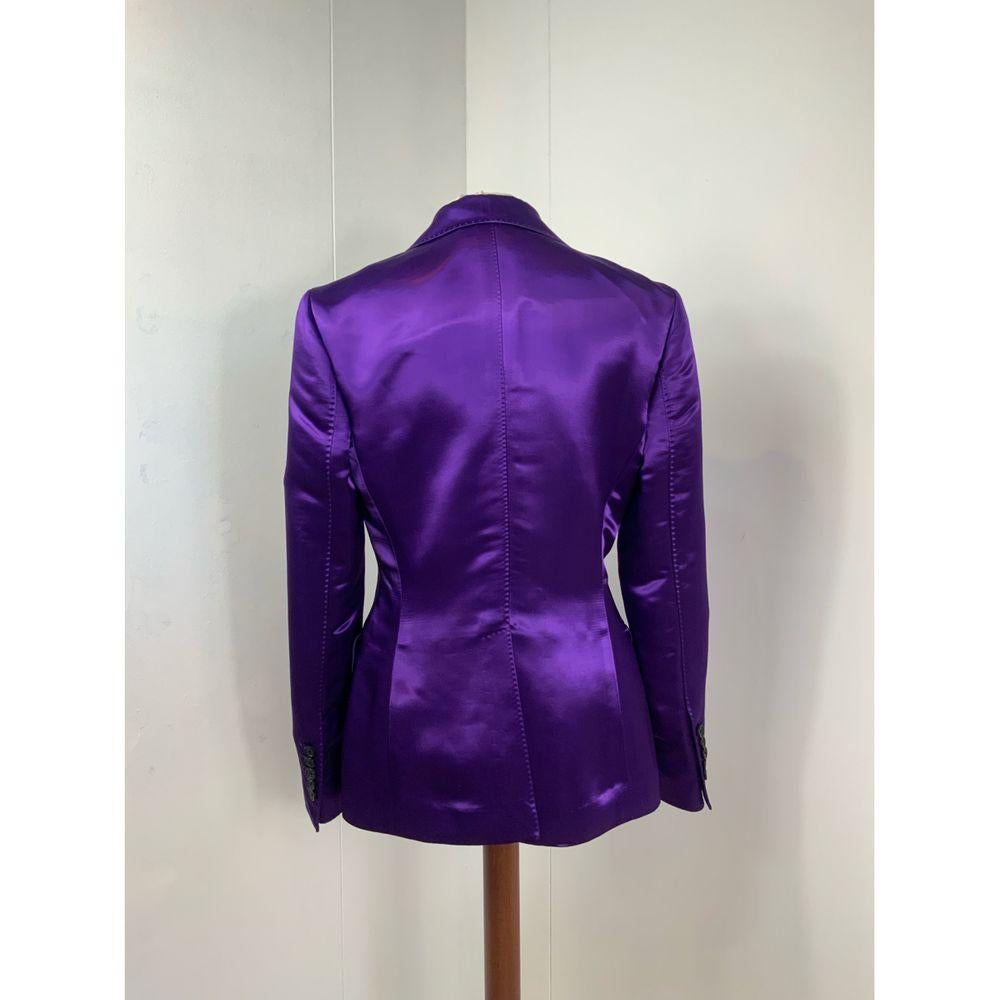 Tom Ford Silk Blazer in Purple

Tom Ford Jacket.
Composition and size label are missing.
We think is silk.
Featuring branded buttons.
It fits an Italian 38\40.
Measurements:
Shoulders 38 cm
Bust 40 cm
Length 72 cm
Sleeves 60 cm
Conditions: Good -