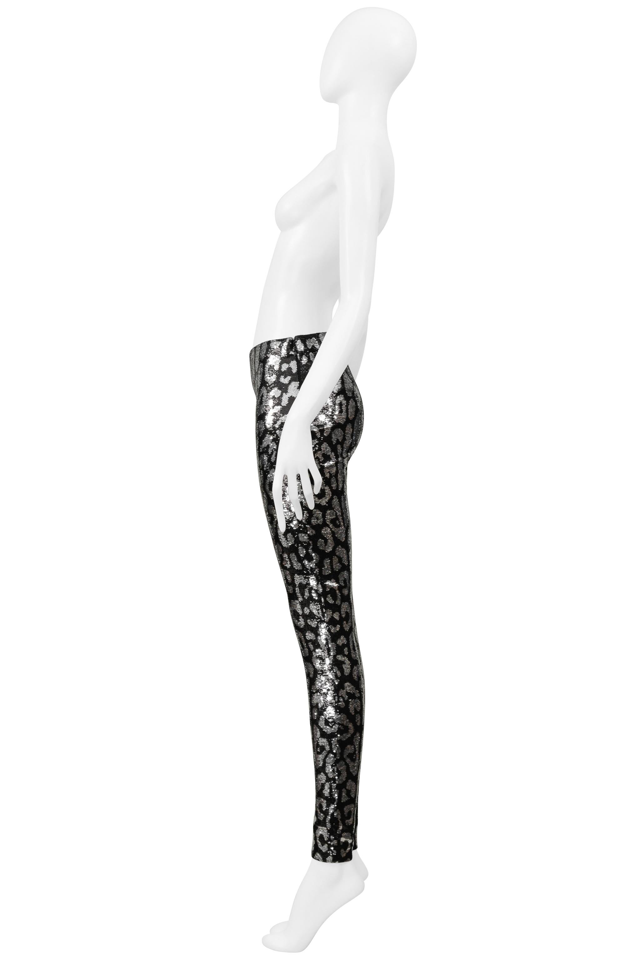 Resurrection Vintage is excited to offer a pair of Tom Ford sequin leggings featuring a leopard print in silver and black sequins, a sexy slim fit, ankle zippers, an elastic waistband, and a side zipper.

Tom Ford
Size: XS 
Fabric: Body: 84%