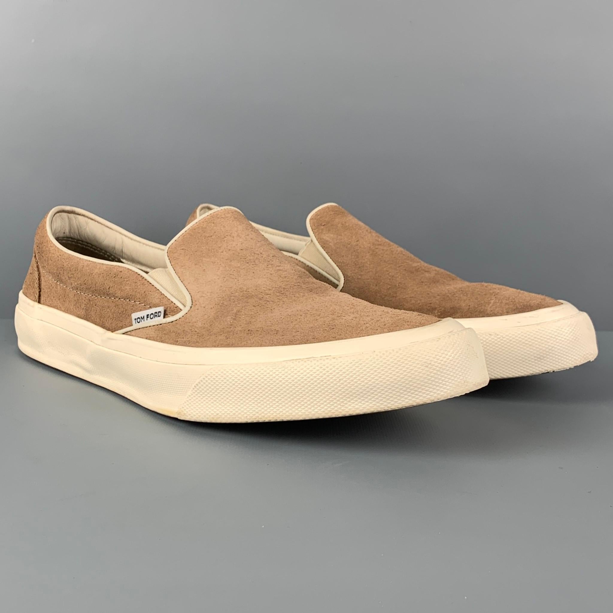 TOM FORD sneakers comes in a khaki suede featuring a slip on style and a rubber sole. Made in Italy. 

Very Good Pre-Owned Condition. Light wear.
Marked: 10

Outsole: 12 in. x 4 in. 