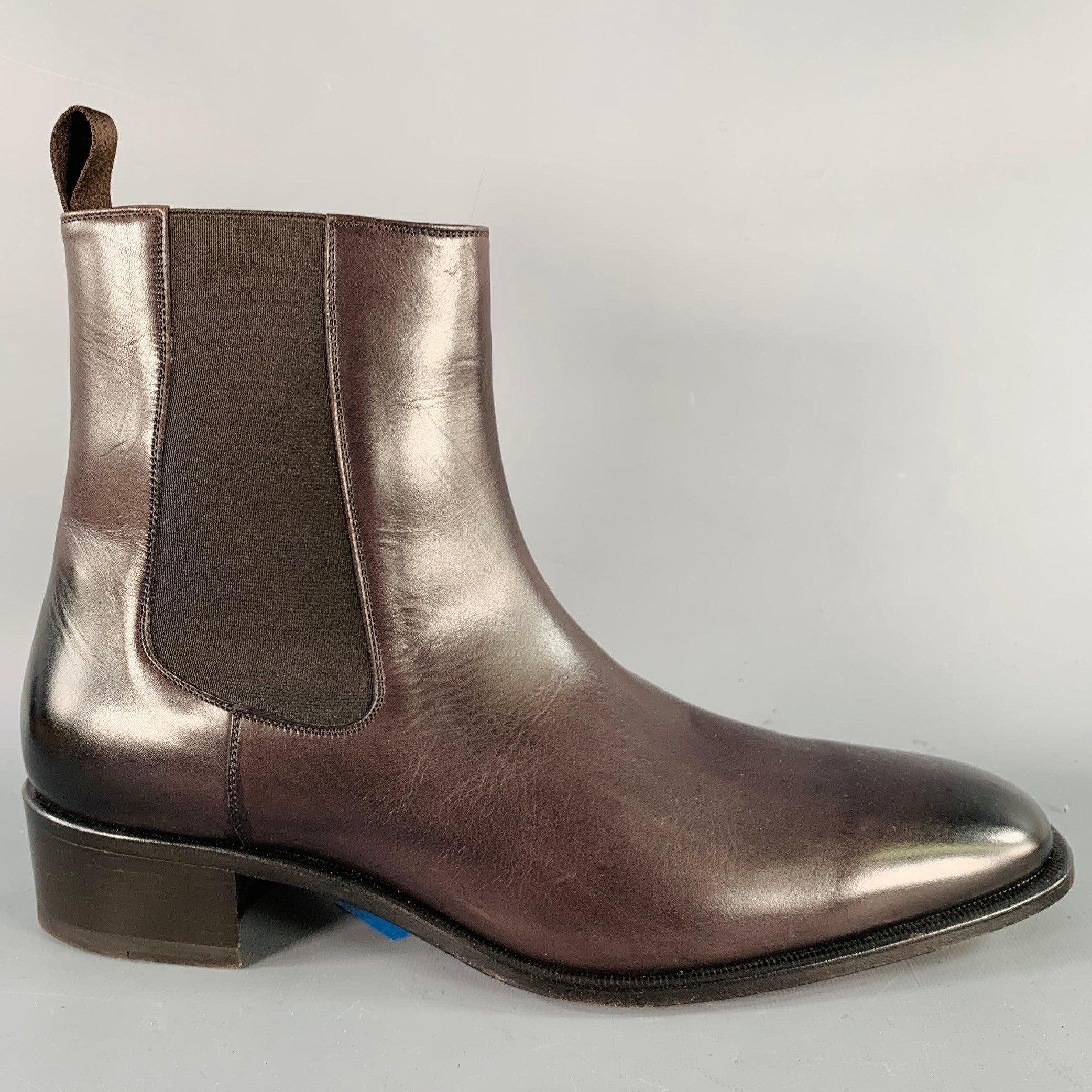 TOM FORD boots
in a purple leather featuring a Chelsea ankle style with elastic panels, leather sole, and pull on closure. Comes with dust bags. Made in Italy.Very Good Pre-Owned Condition. 

Marked:   J 1387 T 10.5Length: 12.25 inches  Width: 4.25