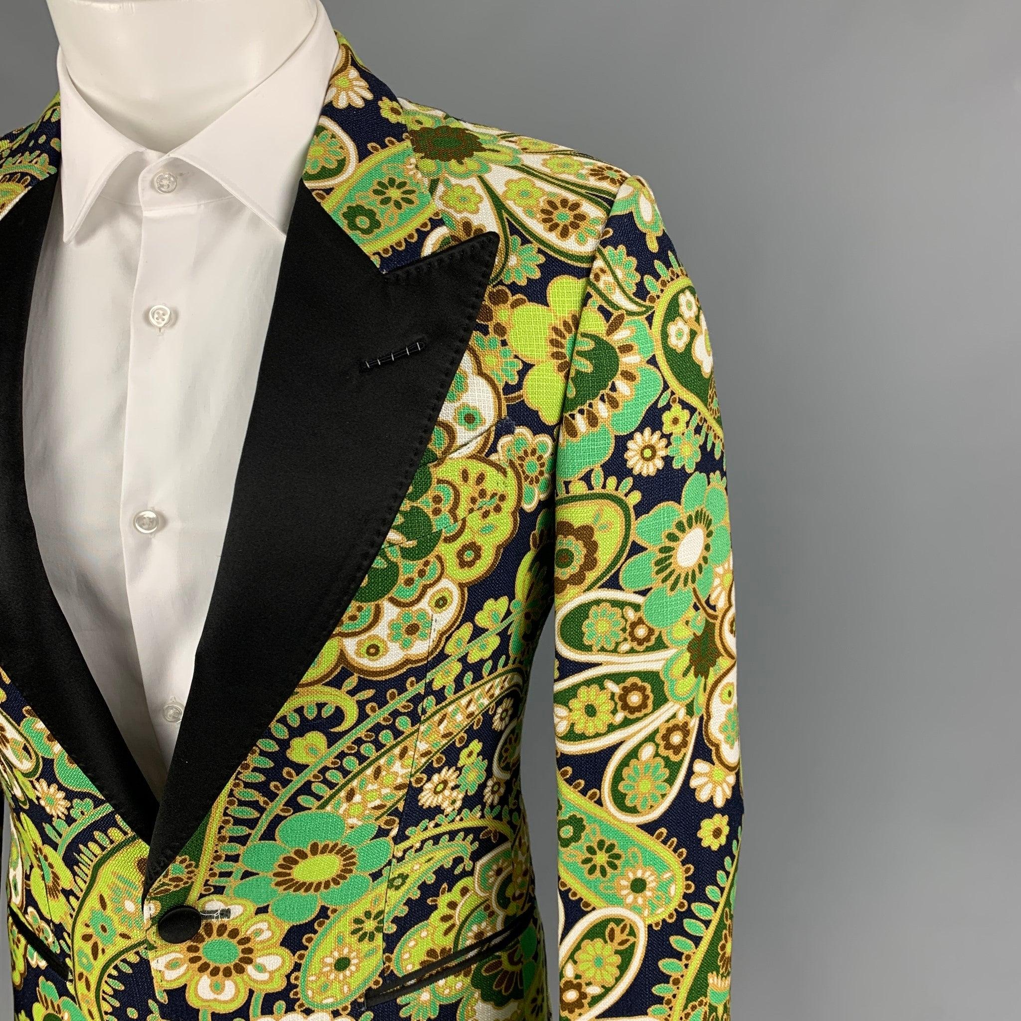 TOM FORD sport coat comes in a multi-color paisley print viscose with a full liner featuring a peak lapel, slit pockets, single back vent, and a single button closure.
New With Tags.
 

Marked:   44 R  

Measurements: 
 
Shoulder: 17 inches  Chest: