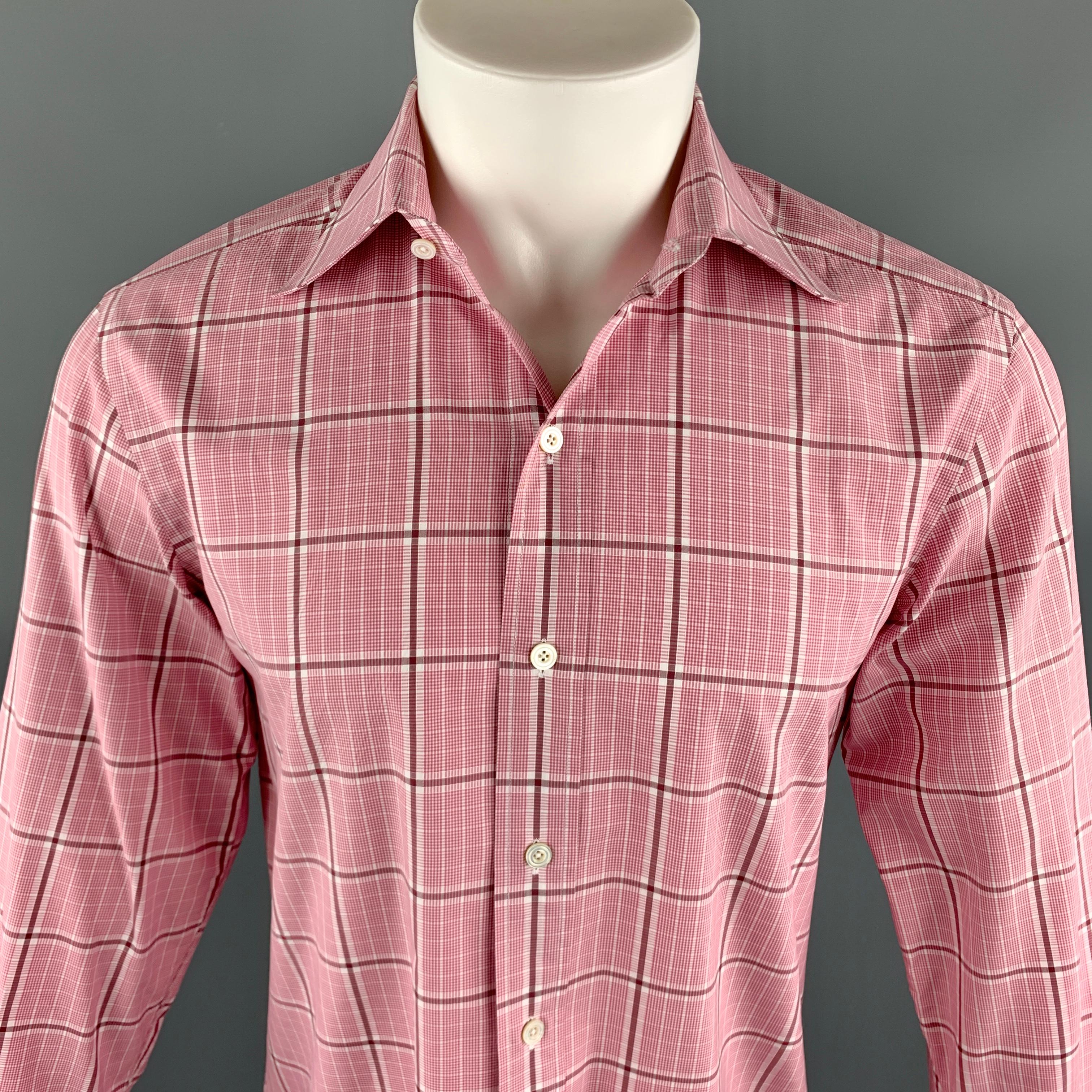 TOM FORD Long Sleeve Shirt comes in a pink plaid cotton material, with a spread collar and double buttoned cuffs, button up. Made in Italy.

Excellent Good Pre-Owned Condition.
Marked: 40  15 3/4

Measurements:

Shoulder: 17.5 in.
Chest: 42 in.
