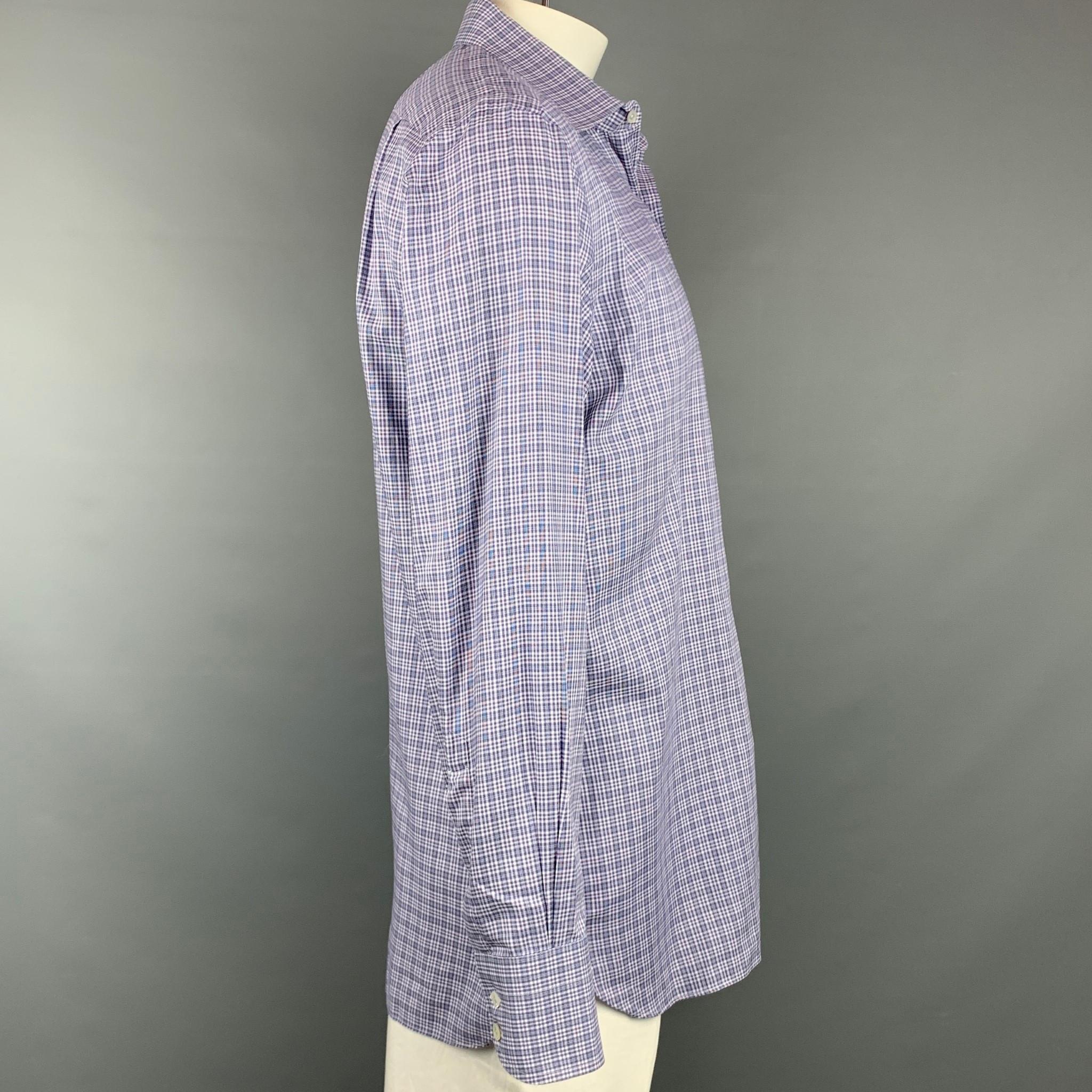 TOM FORD long sleeve shirt comes in a navy & white plaid cotton featuring a button up style and a spread collar. Made in Italy.

Very Good Pre-Owned Condition.
Marked: 43/17

Measurements:

Shoulder: 19 in.
Chest: 46 in.
Sleeve: 26.5 in.
Length: 32