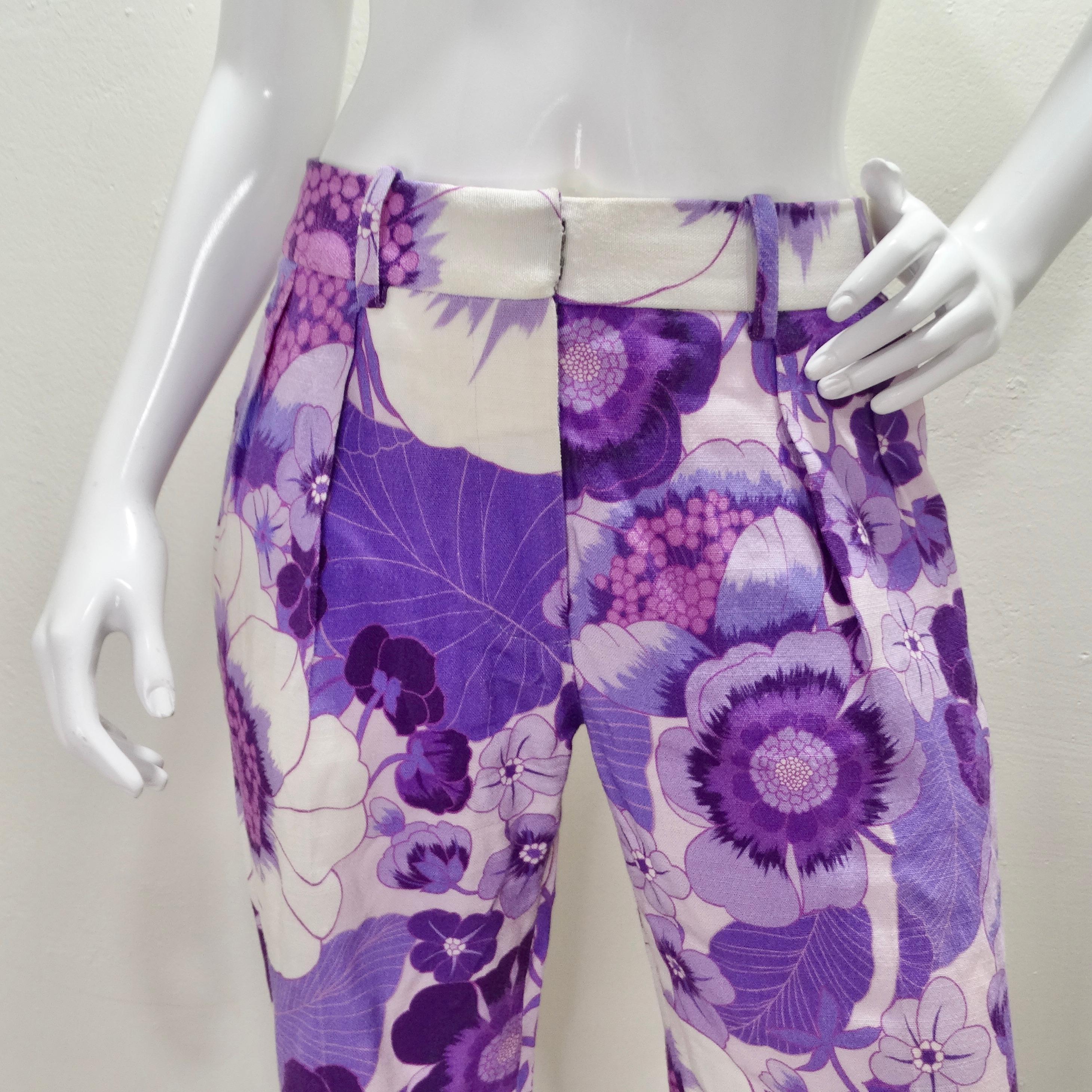 
Introducing the Tom Ford Spring 2021 Purple Floral Print Trousers, a rare and enchanting addition to your wardrobe that effortlessly marries style and comfort. These trousers are adorned with a whimsical and eye-catching purple floral pattern. The