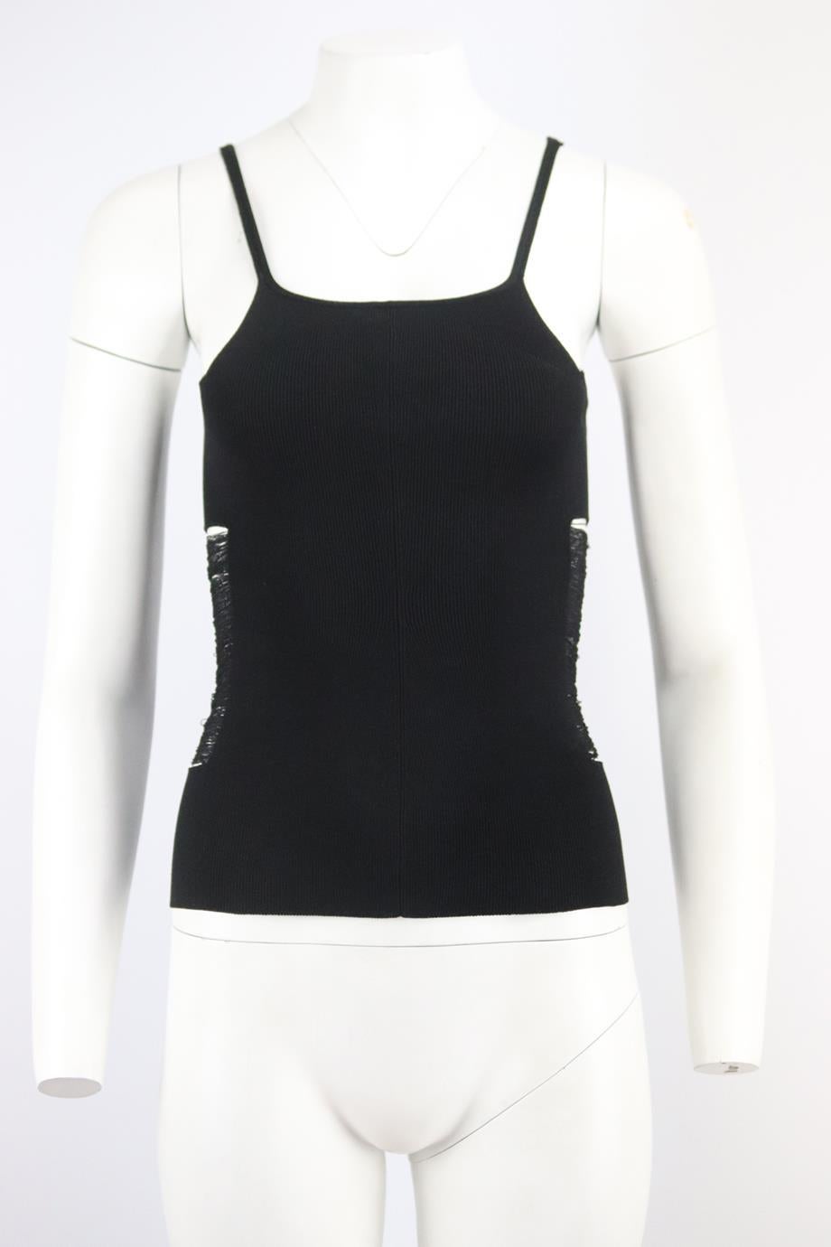 Tom Ford stretch knit top. Black. Sleeveless, crewneck. 88% Viscose, 12% polyester. Size: Small (UK 8, US 4, FR 36, IT 40). Bust: 22 in. Waist: 22 in. Hips: 23 in. Length: 20 in. Very good condition - No sign of wear; see pictures.
