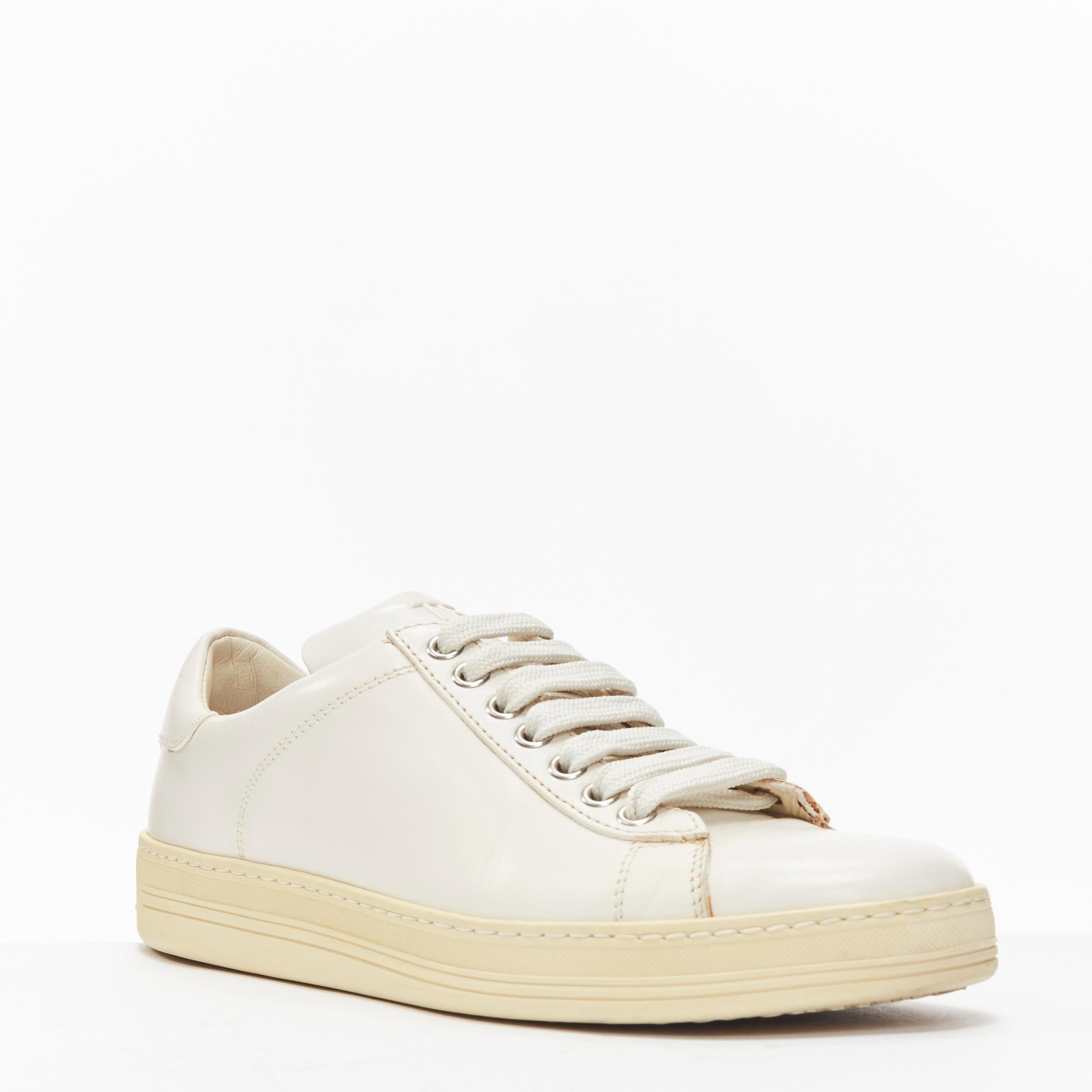 TOM FORD TF logo cream stiff leather minimal classic lace up sneakers EU36
Reference: LNKO/A02142
Brand: Tom Ford
Material: Leather
Color: Cream
Pattern: Solid
Closure: Lace Up
Lining: Cream Leather
Extra Details: TF logo at shoe tongue and TOM FORD