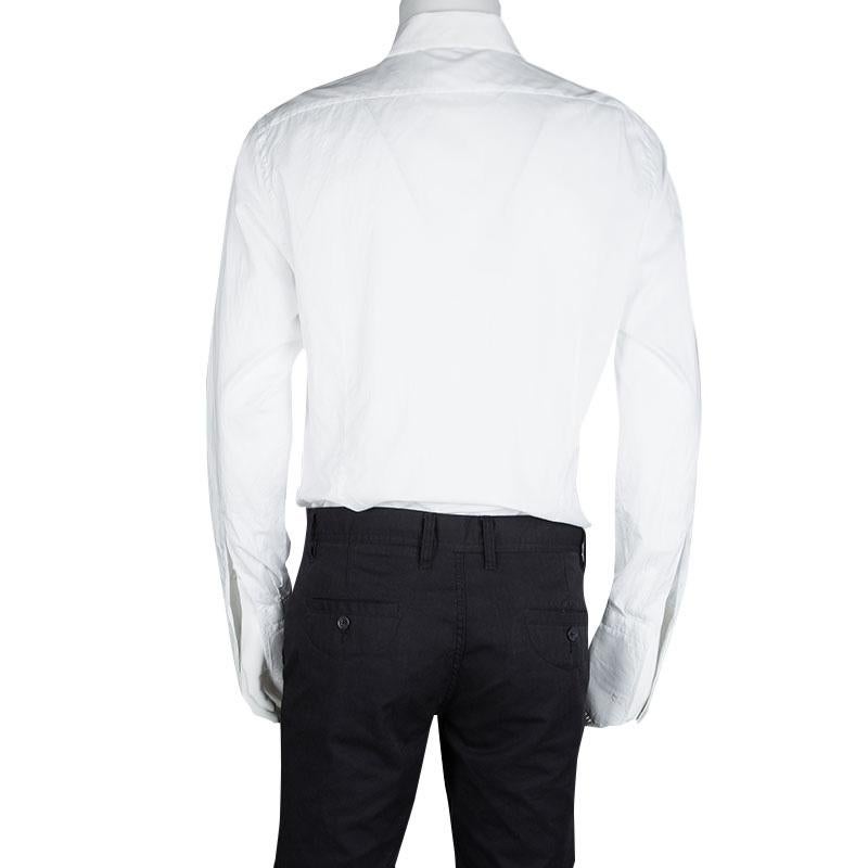 Sharp, neat and Tom Ford! Tailored wonderfully from cotton, this white shirt by Tom Ford will complement your tuxedos with class. It has been styled with a collar, front buttons, long sleeves, and pintuck details.

Includes: The Luxury Closet