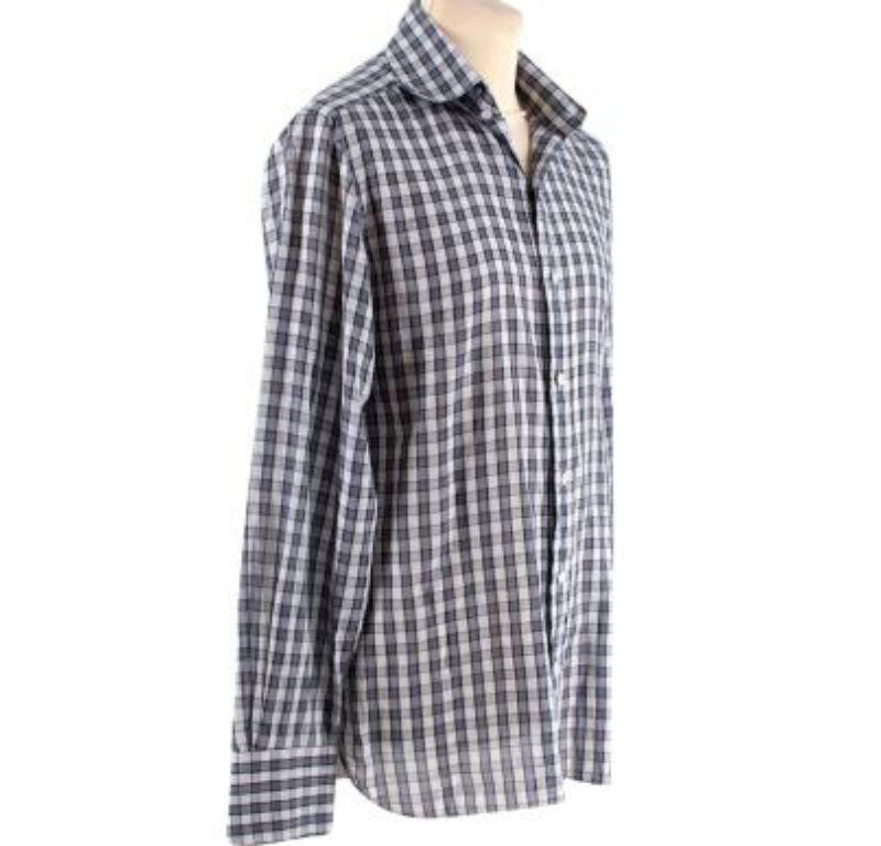 Tom Ford White, Grey and Navy Checkered Shirt 

- Luxuriously soft cotton.
- Classic fit
- Button-down shirt.

Country of origin faded. 
Wash carefully at 30 degrees, do not bleach. 
Condition 9.5/10.

PLEASE NOTE, THESE ITEMS ARE PRE-OWNED AND MAY