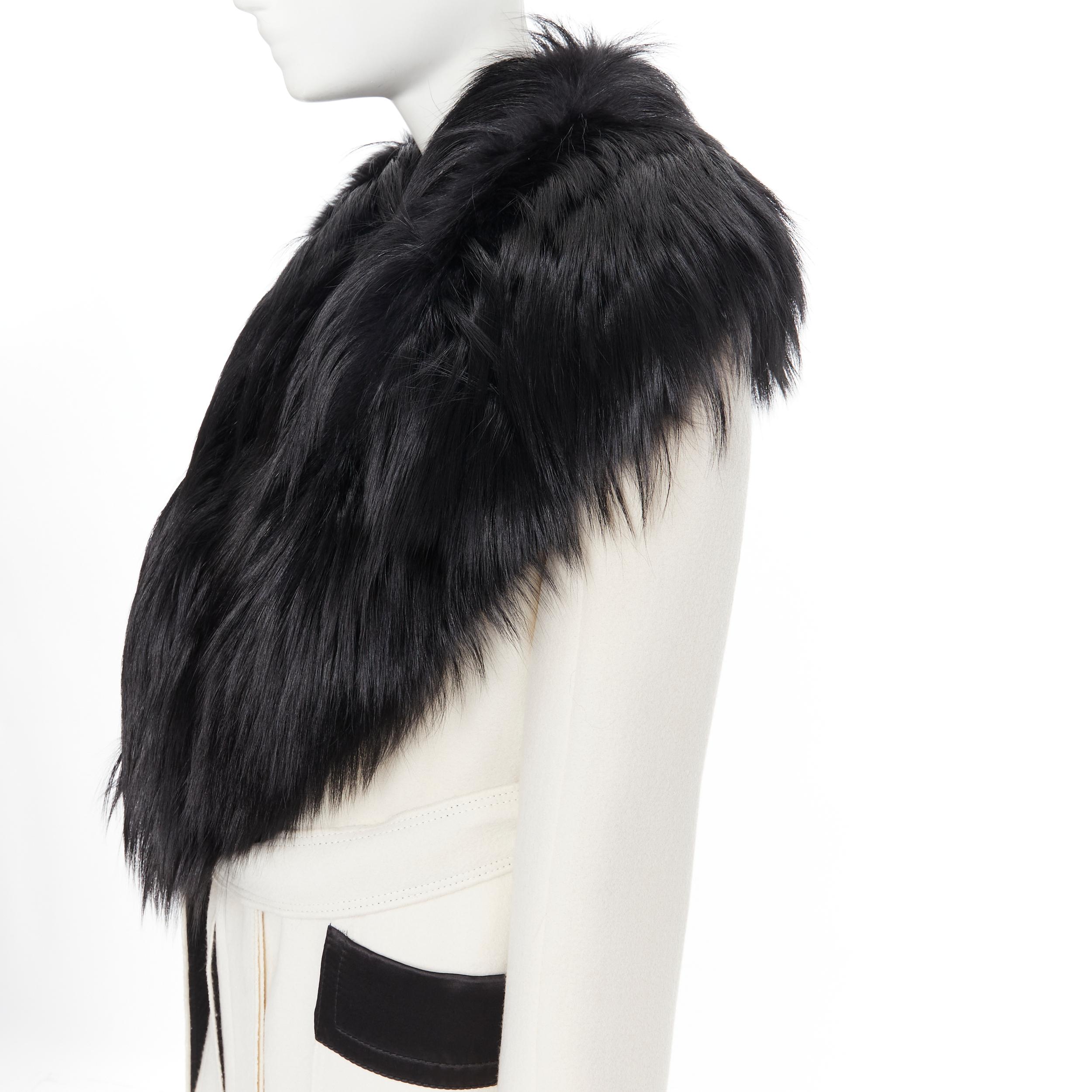 TOM FORD white wool crepe black fox fur collar quilted belted robe coat IT40 S 
Reference: GIYG/A00007 
Brand: Tom Ford 
Designer: Tom Ford 
Material: Wool 
Color: White 
Pattern: Solid 
Closure: Button 
Extra Detail: Fleece wool outer. Genuine fox