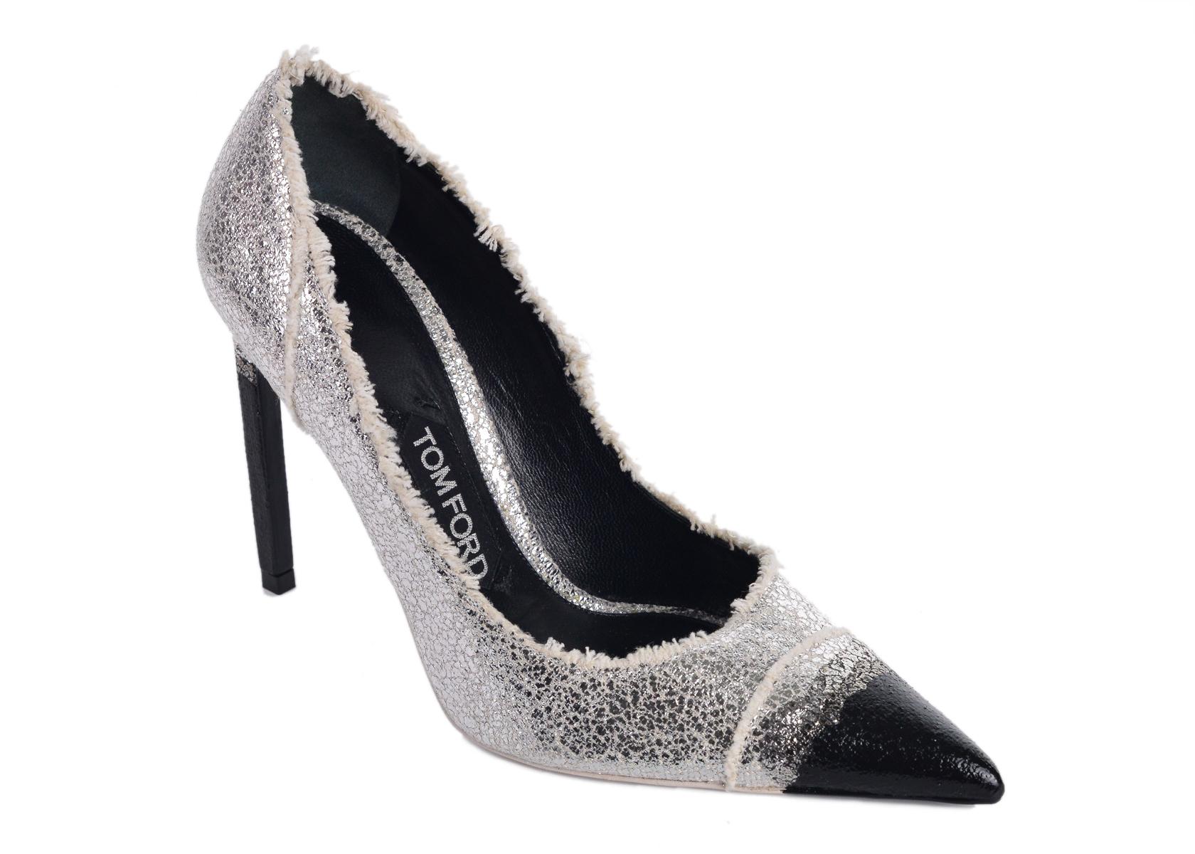 Tom Ford's frayed canvas pumps. These striking pumps feature a two tone black and metallic silver for a striking and stunning eye catching look. Beautifully crafted and can be paired with a black dress for the perfect completed night out look.

Tom