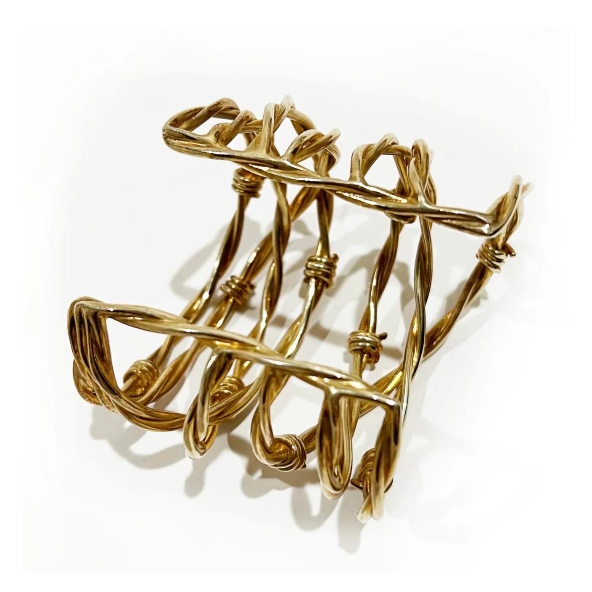 Wrapped barbed wire cuff by Tom Ford 
Gold vermeil plated silver 
Twisted, Intertwined 