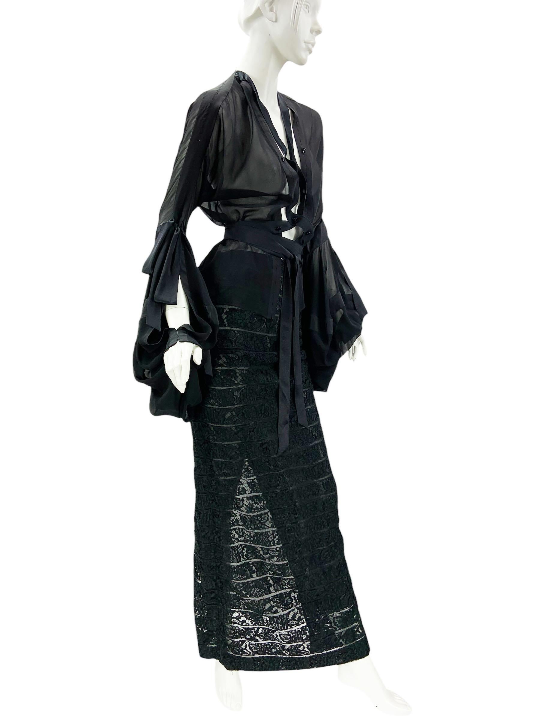 Tom Ford for Yves Saint Laurent Rive Gauche Lace-Up Blouse with Lace Skirt Suit
F/W 2002 Runway Collection
French size 38 - US 6
Very romantic, and in same time very sexy look.
Black silk sheer blouse featuring  adjustable button-up ribbon accented