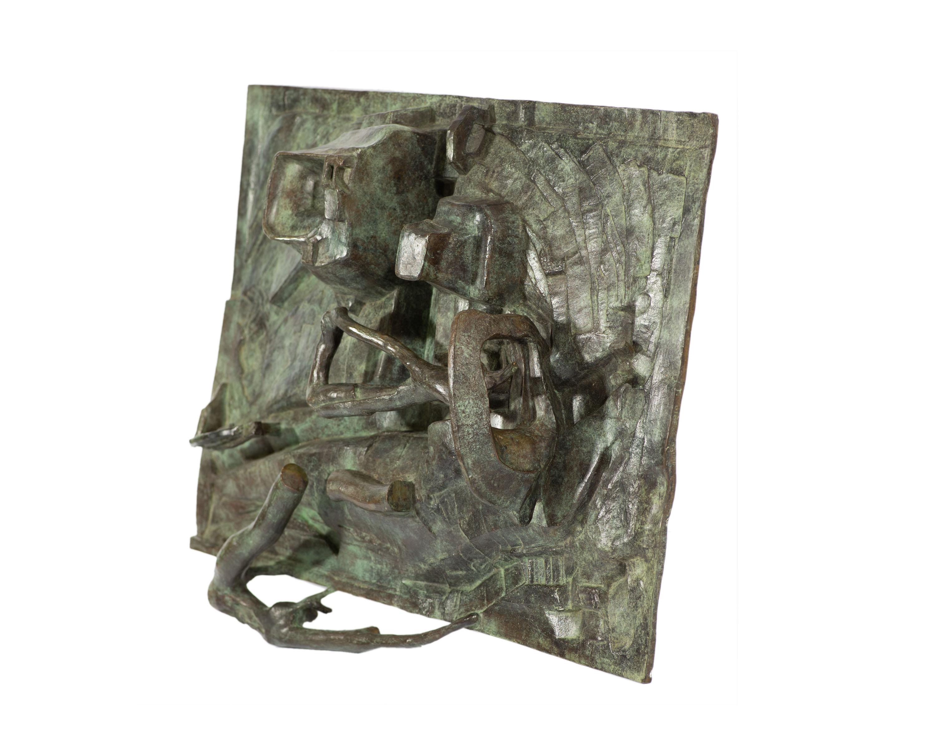 A cast bronze wall sculpture by American artist Tom Gibbs. Made in 1989, this work emanates a strong presence in any interior style. Illustrative and raised geometric elements extend from a rectangular base. Recessions in the work allude to an