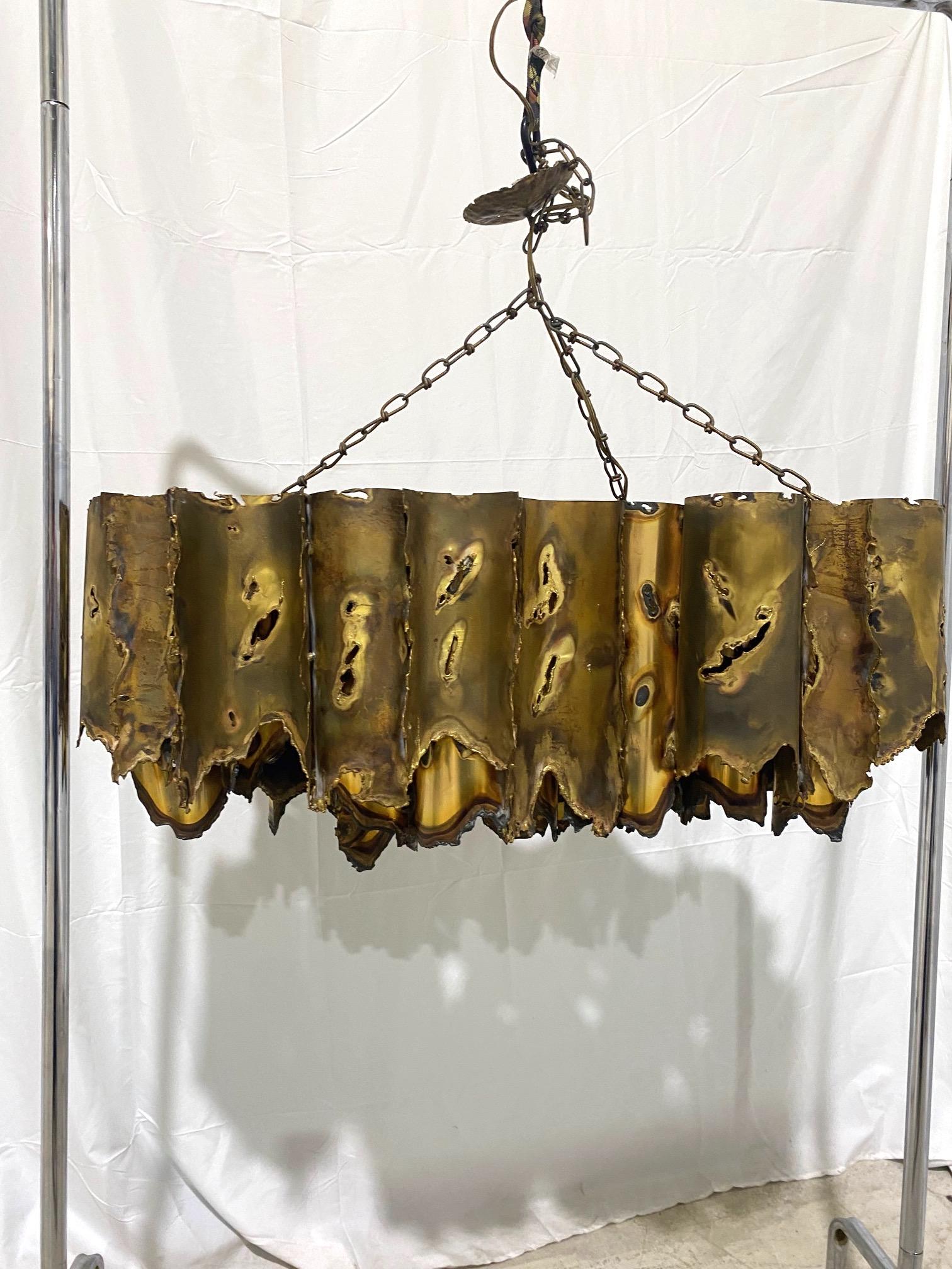 Tom Greene 1960s Brutalist Torch Cut Rectangular Brass Chandelier In Good Condition For Sale In Montclair, NY