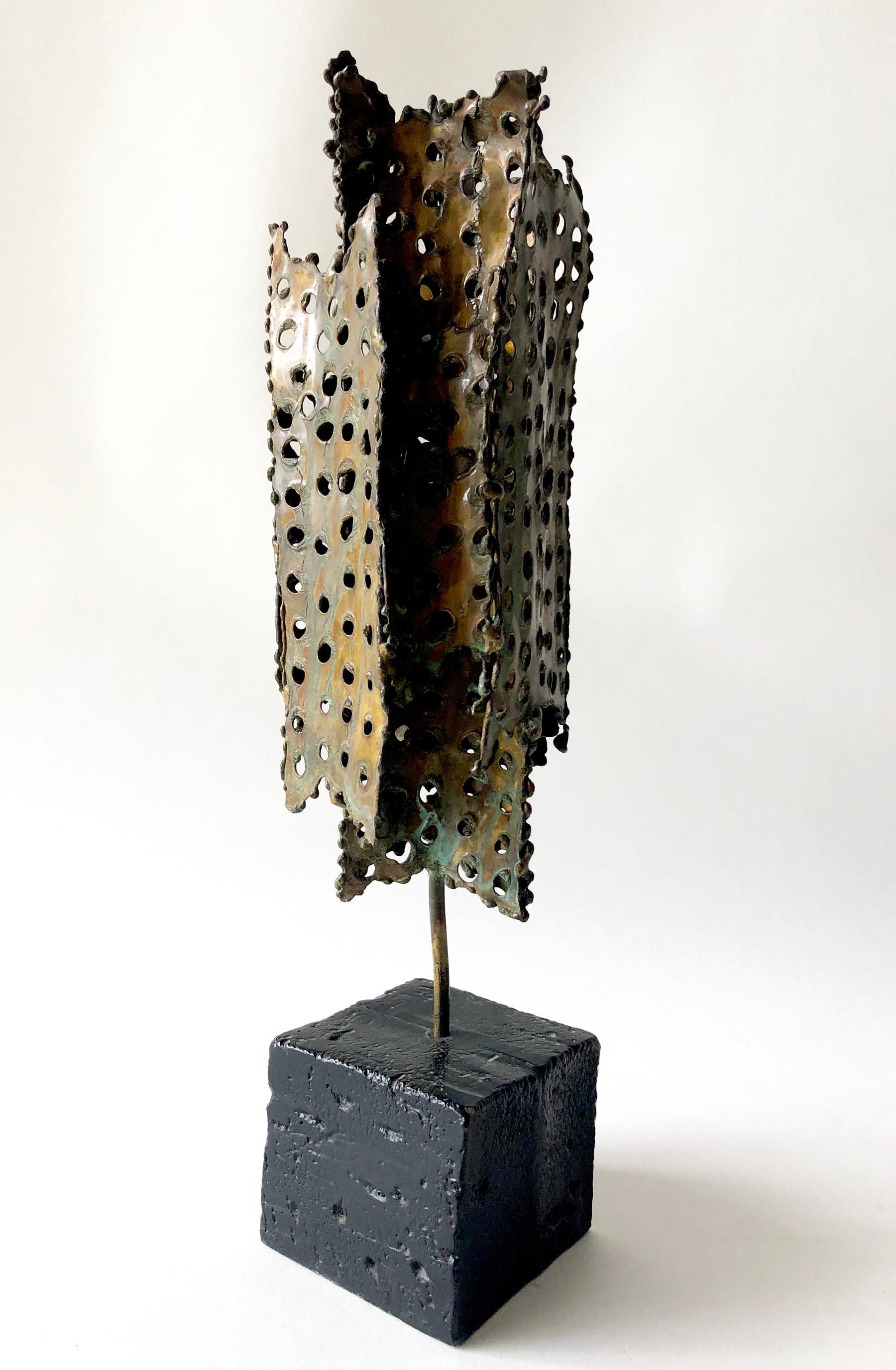 Perforated metal sculpture by Tom Greene, circa 1960s. Sculpture measures 13.5