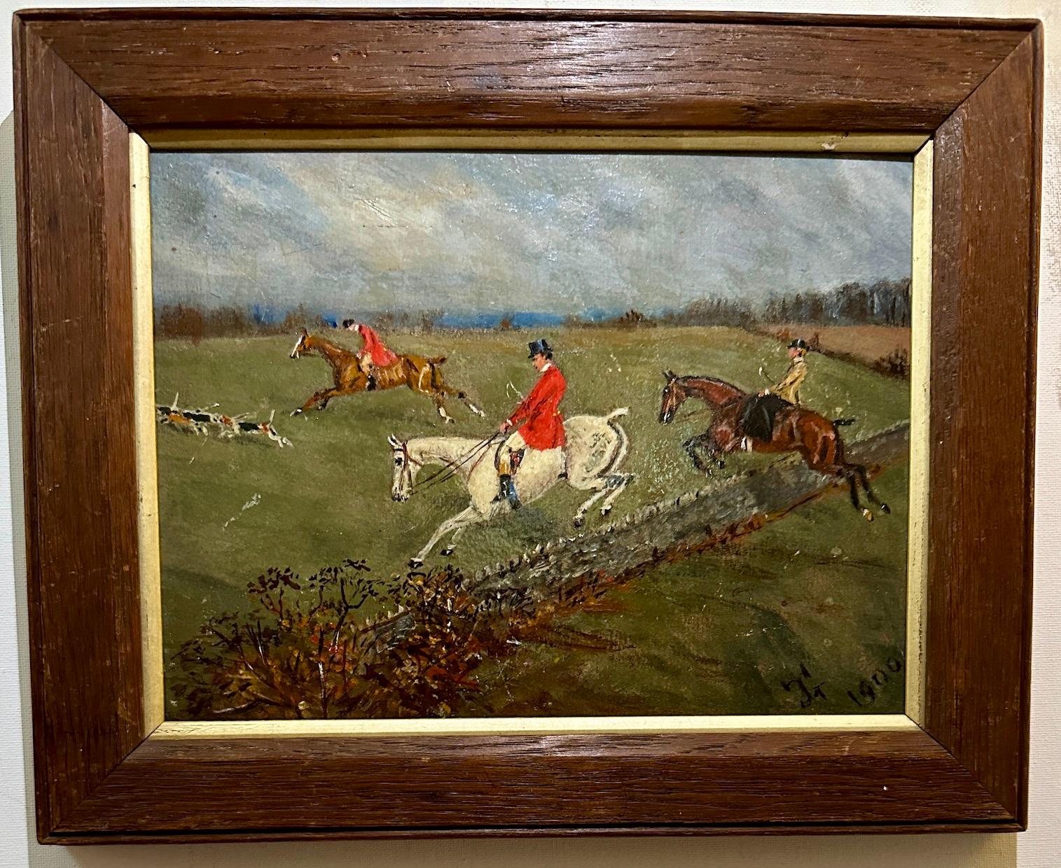 Ancienne scène de chasse de renard anglaise avec un chasseur sautant avec des chiens dans un champ