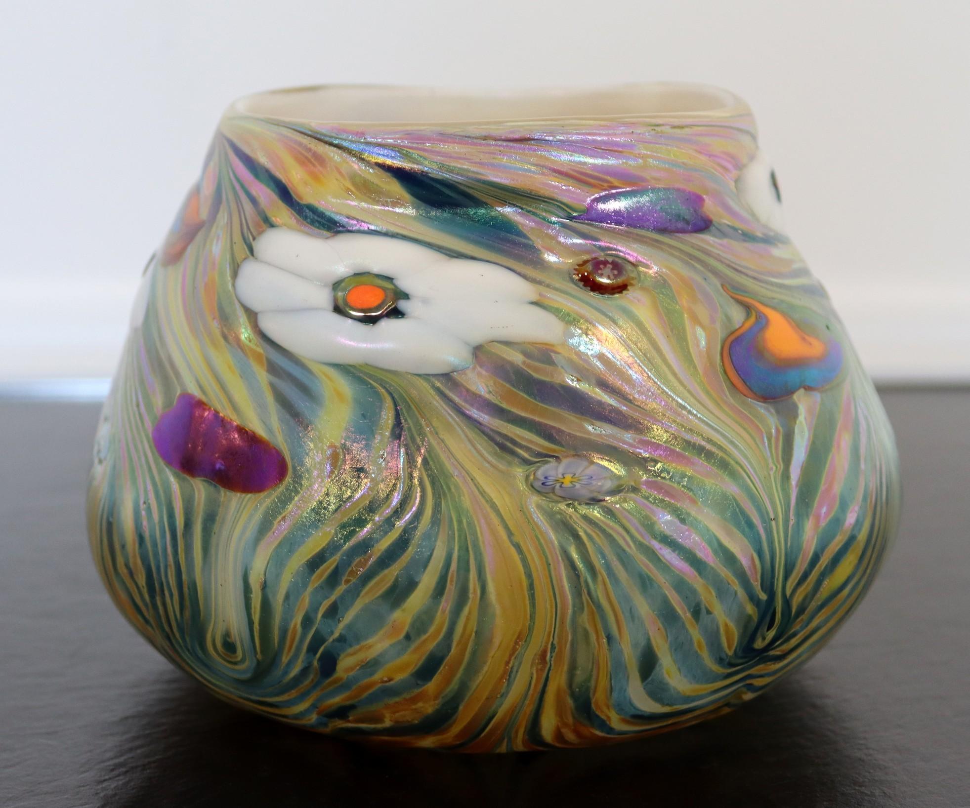 For your consideration is a marvelous hand blown iridescent carnival glass vessel with a flower design titled 
