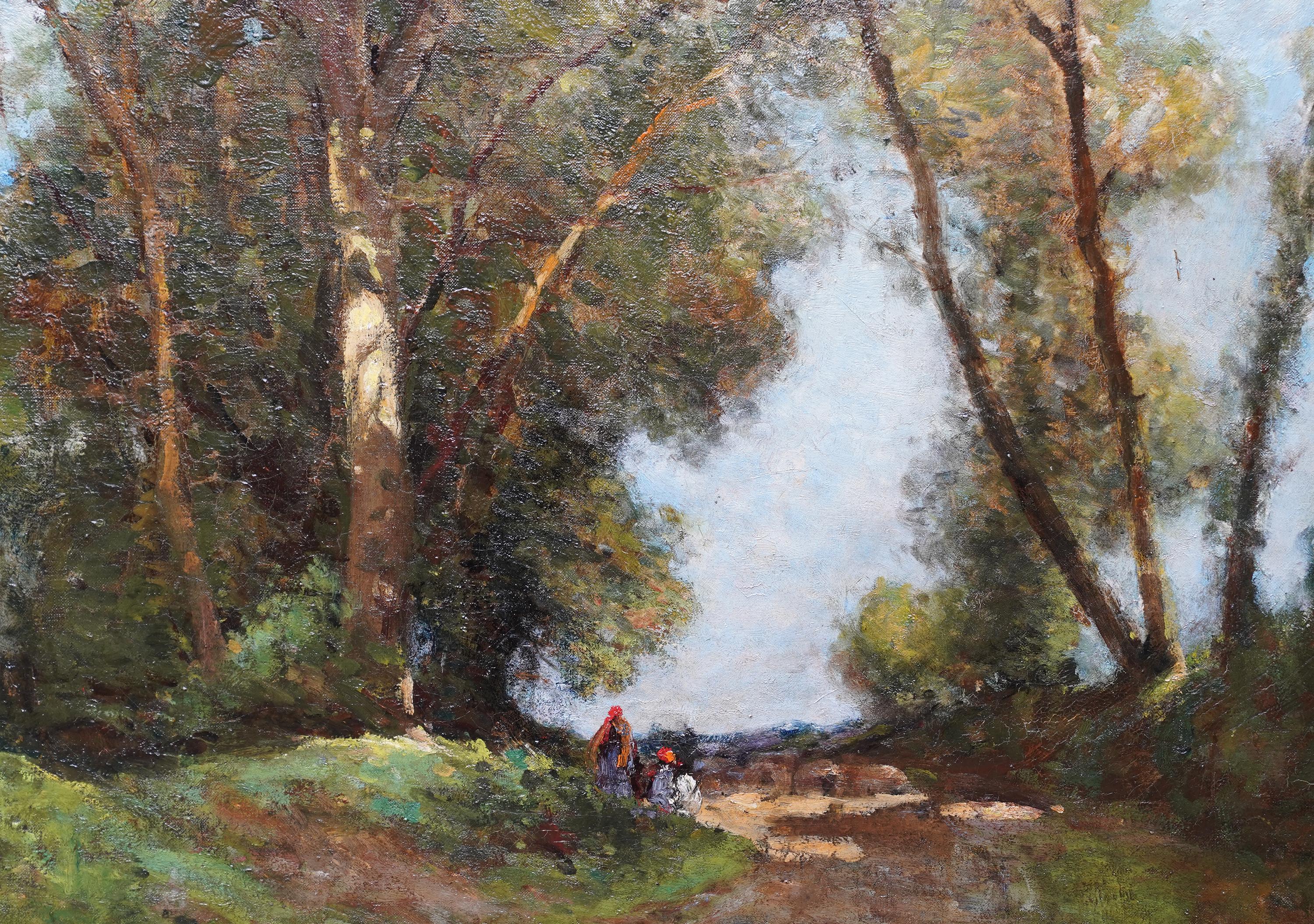 This charming British Edwardian oil painting is attributed to the circle of Tom Mostyn. Painted circa 1910 it is a wooded landscape with figures stopping to rest on a path bathed in dappled sunlight. Above them stand majestic trees stretching up to