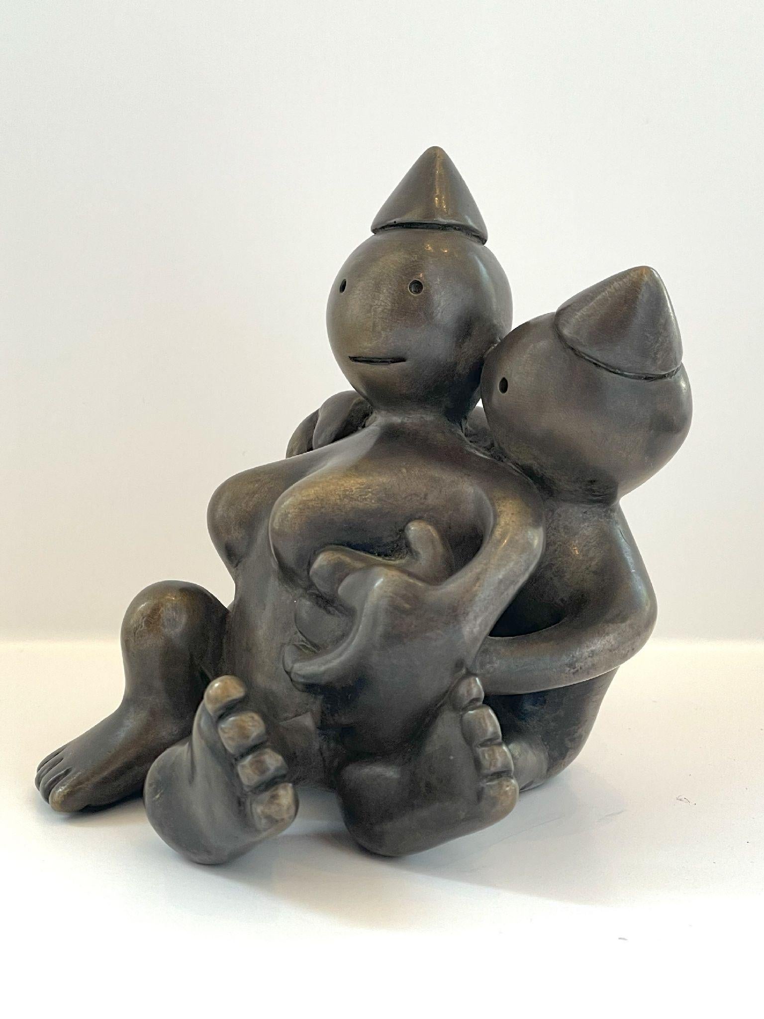 Amanti - Figurative Sculpture Oro di Tom Otterness