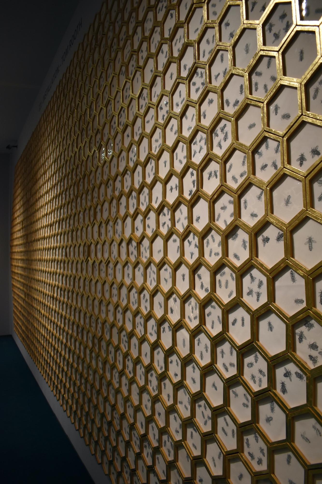 'Honeycomb' was created  by Tom Rooth in the Cambrian Mountains of Wales, where Tom lives off-grid.

Each ceramic Honeycomb panel has been handmade, drawn, glazed and fired in the Cambrian Mountains of Wales. The frames are also handmade, and have