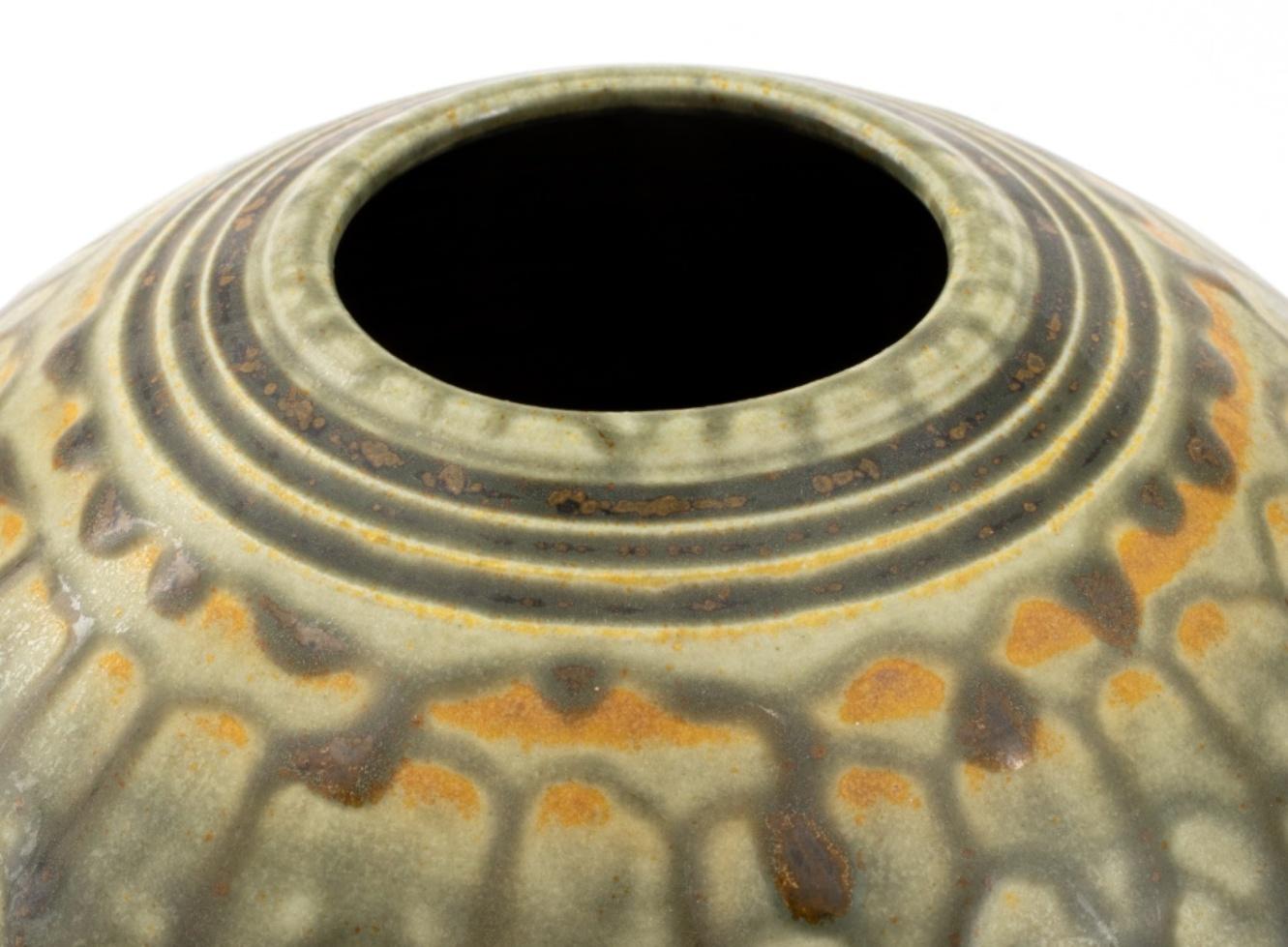 Tom Turner Modernist North Carolina porcelain studio ceramic vase, globular with green drip glaze, bearing incised signature 
