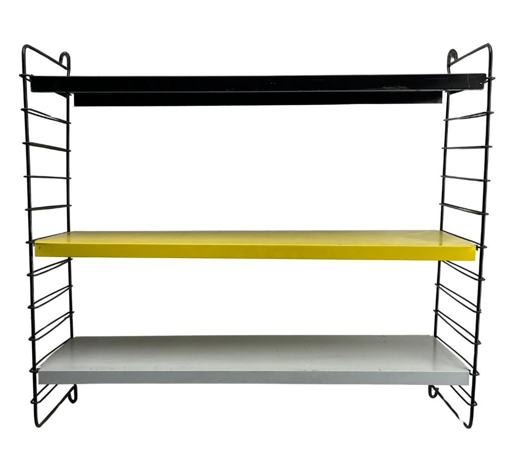 Tomado Shelving System by D. Dekker, Netherlands, 1960s

Please don't hesitate to get in touch with any further questions.  
With Best Wishes 

Geert Niessen
