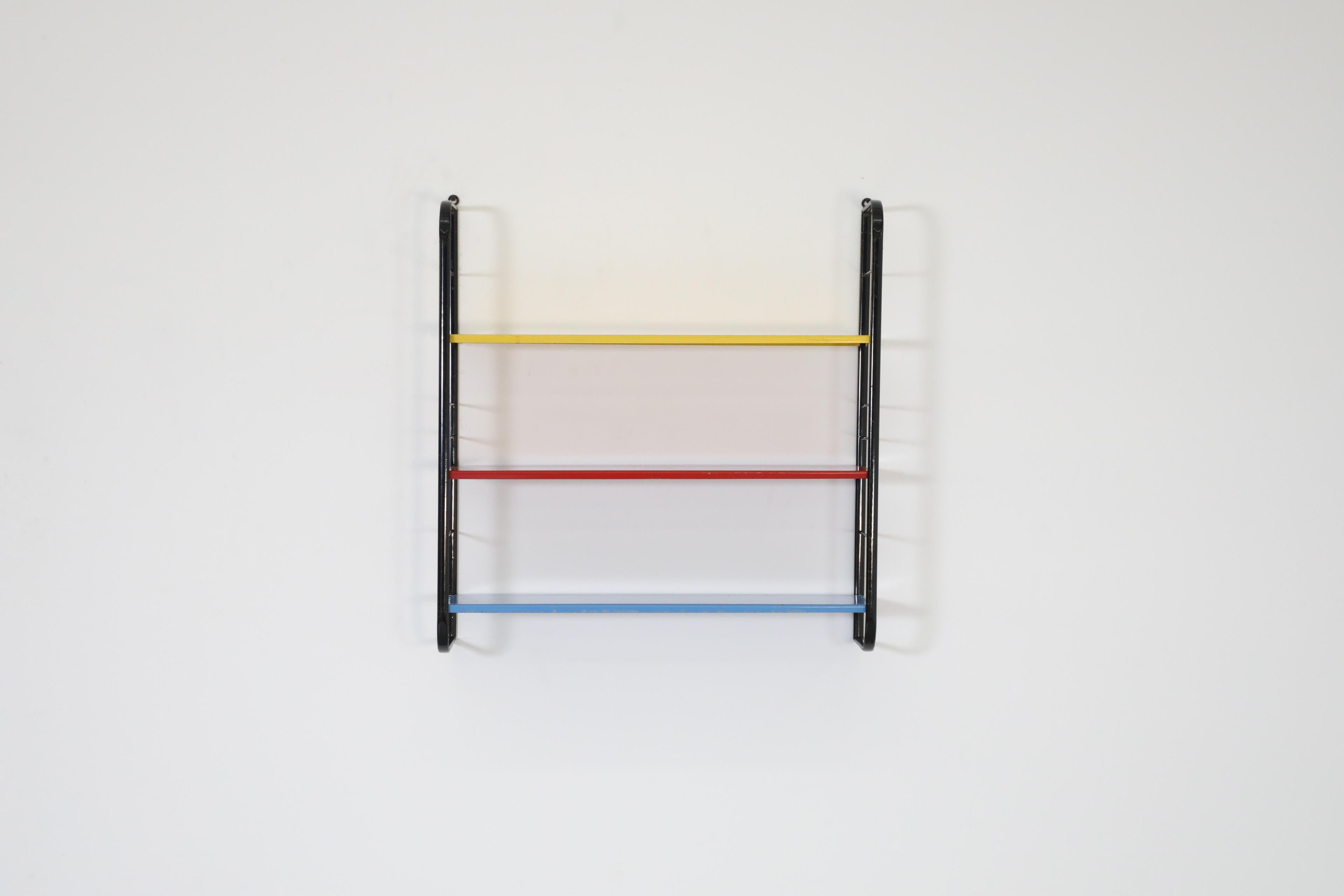 Mid-Century Modern Tomado Style Wall Shelving Unit w/ Black Frame and Yellow, Red, & Blue Shelves For Sale