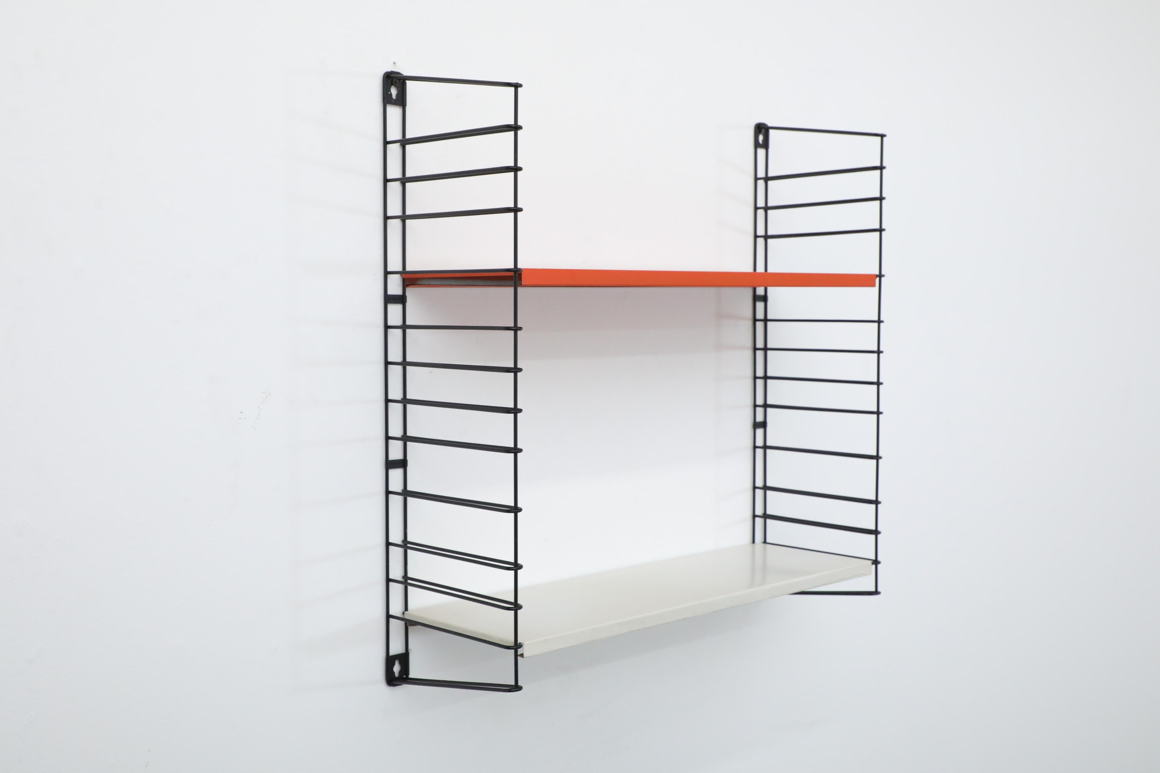 Enameled Tomado Wall Mount Black Wire Shelving Unit with Red and White Shelves For Sale