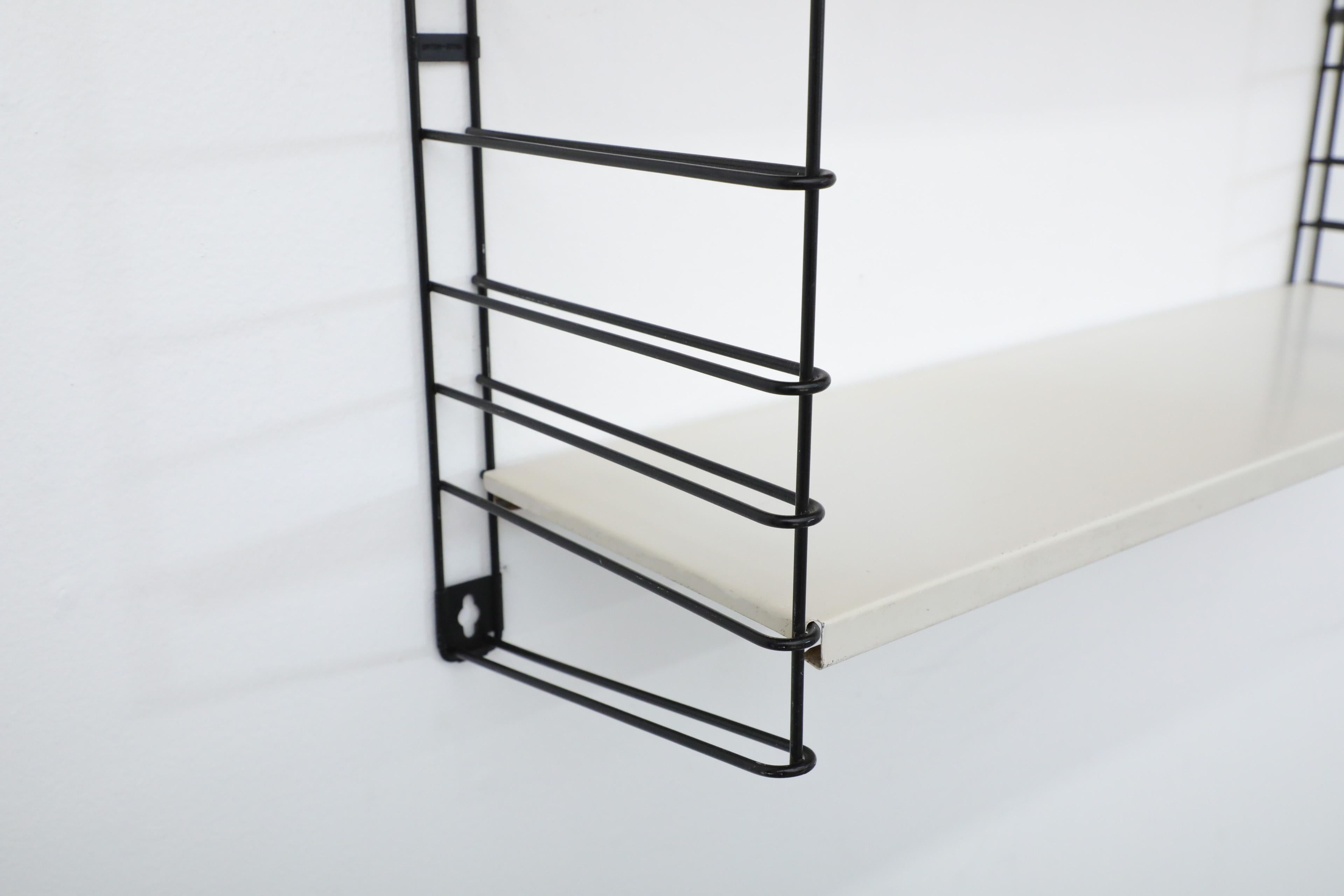 Mid-20th Century Tomado Wall Mount Black Wire Shelving Unit with Red and White Shelves For Sale