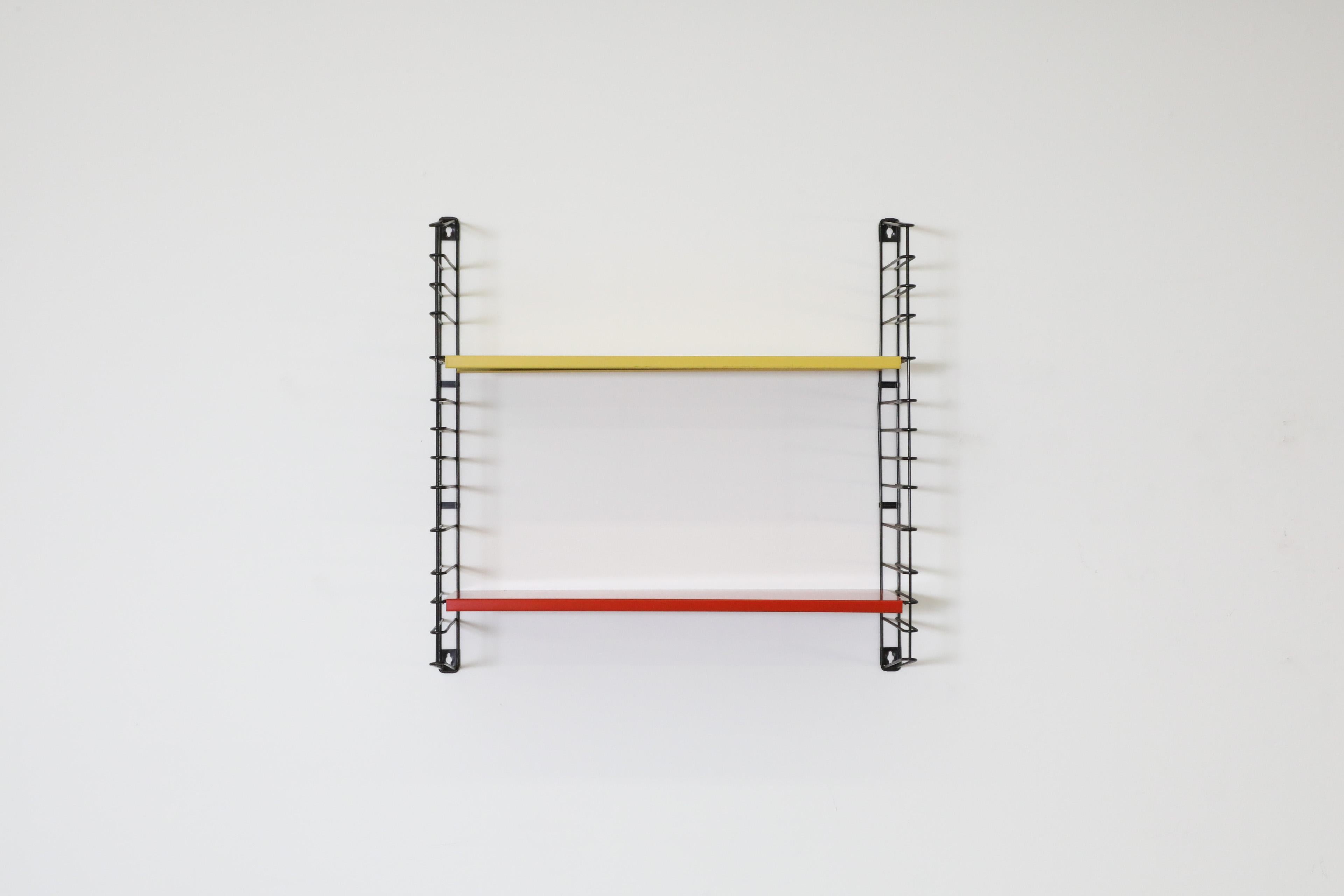 Mid-Century Modern Tomado Wall Mount Red and Yellow Shelving Unit For Sale