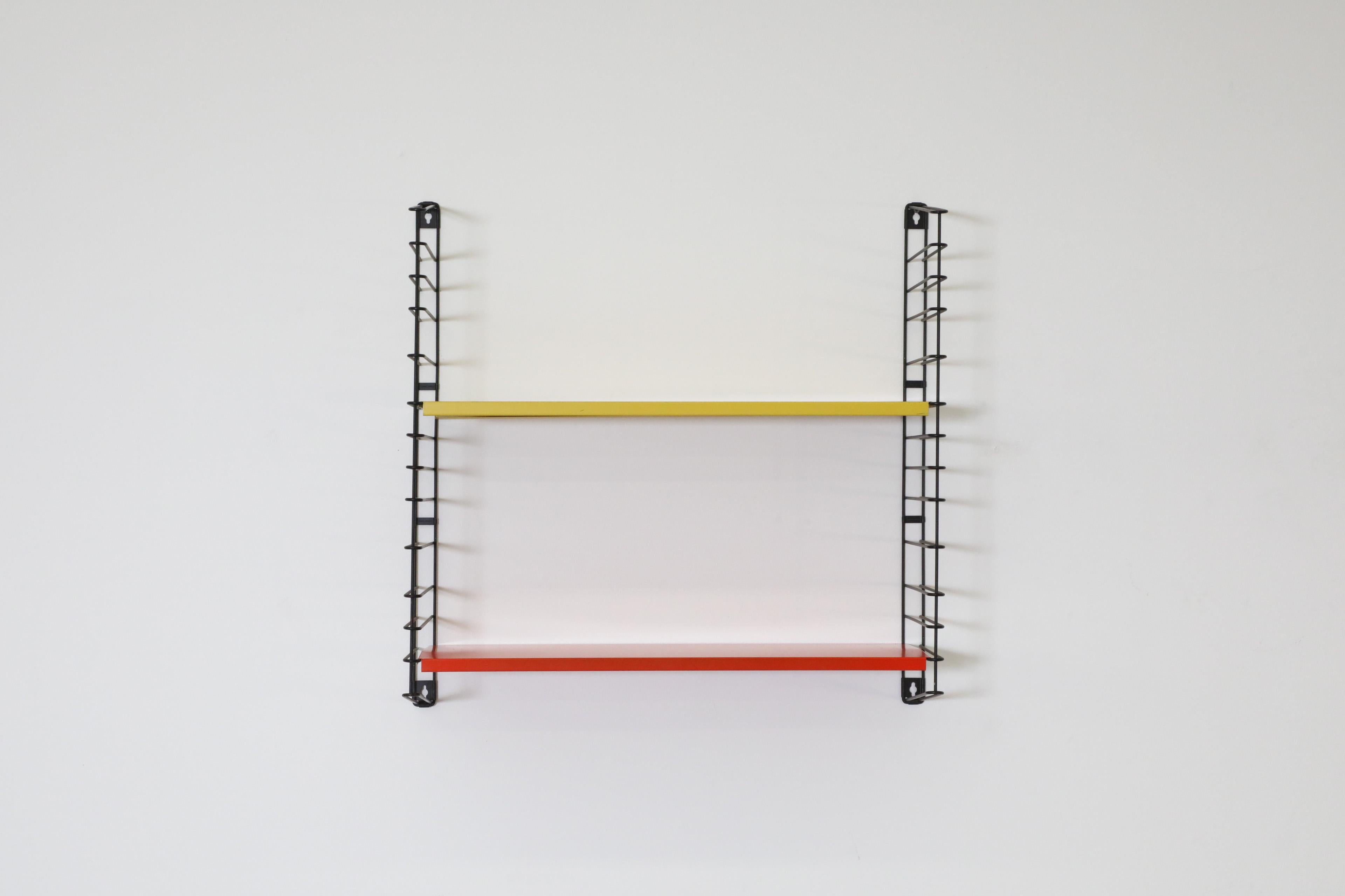 Mid-Century Modern Tomado Yellow and Orange Wall Mount Shelving Unit with Black Frame For Sale