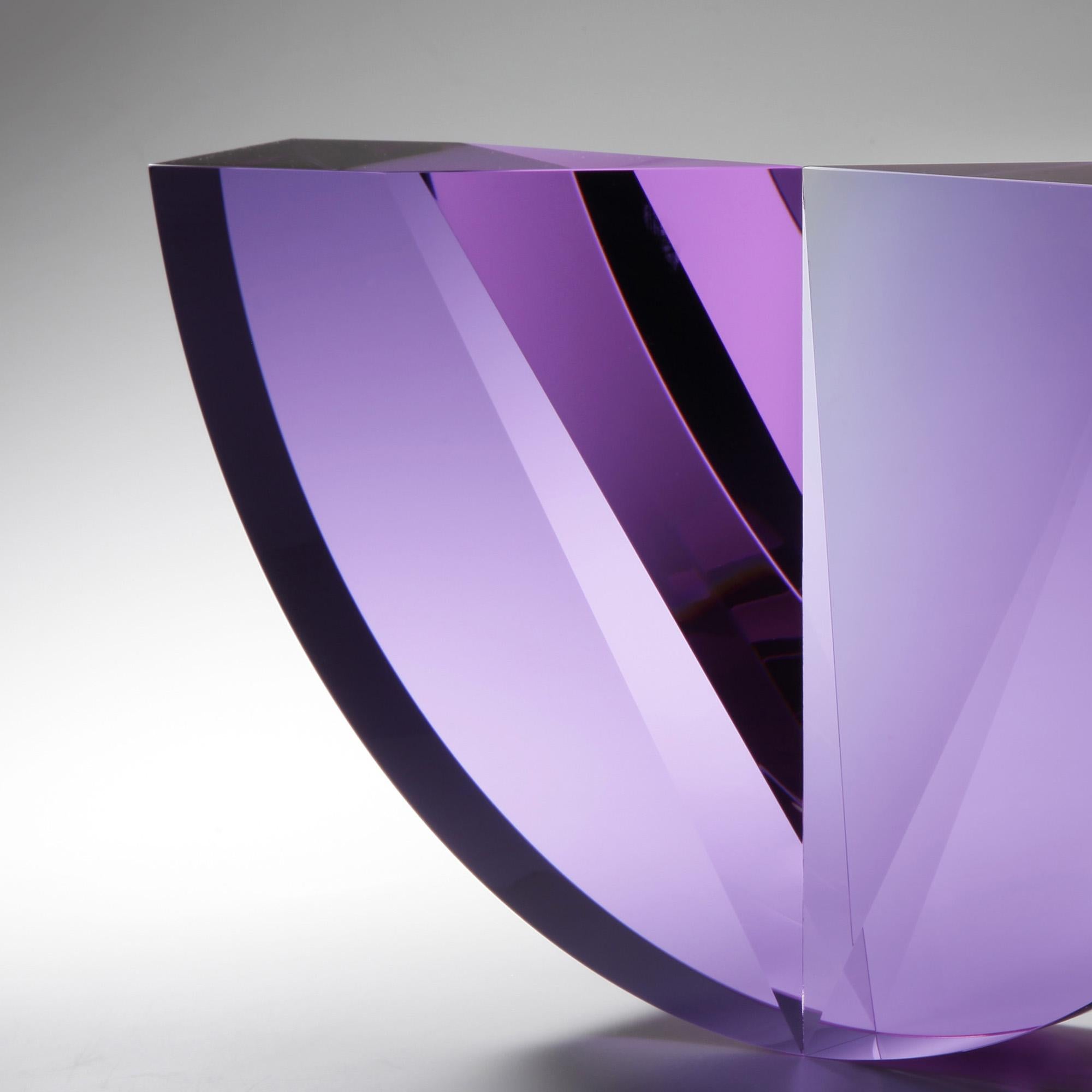 This abstract optic glass sculpture created by Czech artist Tomas Brzon is noteworthy for both its geometric shape and purity. Brzon uses pure optic glass, void of any defects, which enables its perfection to shine through. The cuts and contours of